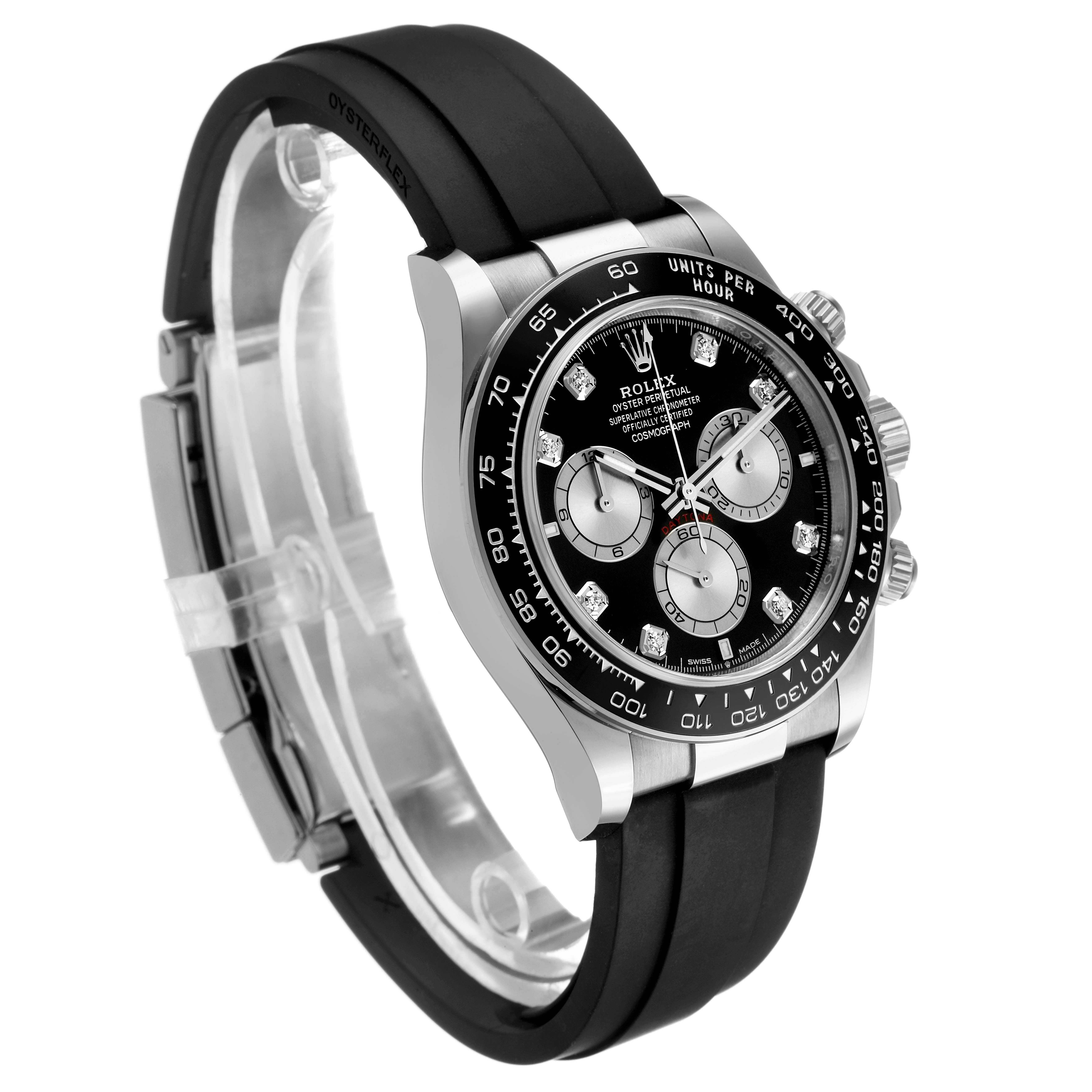 The Rolex Daytona 126519 Men's White Gold Black Dial watch is shown at a three-quarter angle, highlighting the black dial, bezel, and rubber strap.