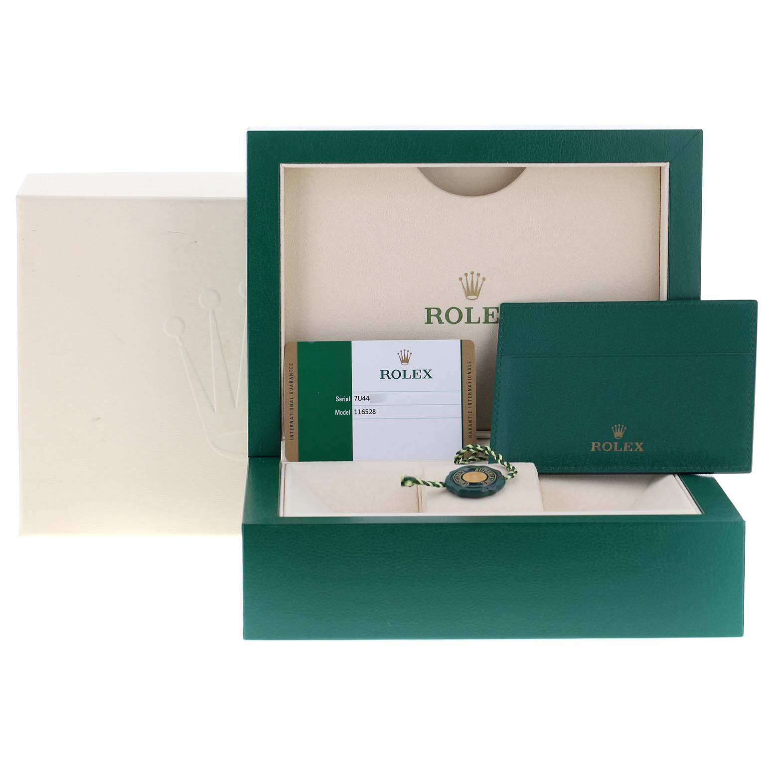 The image shows an open green Rolex Daytona 116528 Men's Yellow Gold Mother of Pearl Dial 116528 Men's Yellow Gold Mother of Pearl Dial watch box with its warranty card, a green cardholder, tag, and outer box.