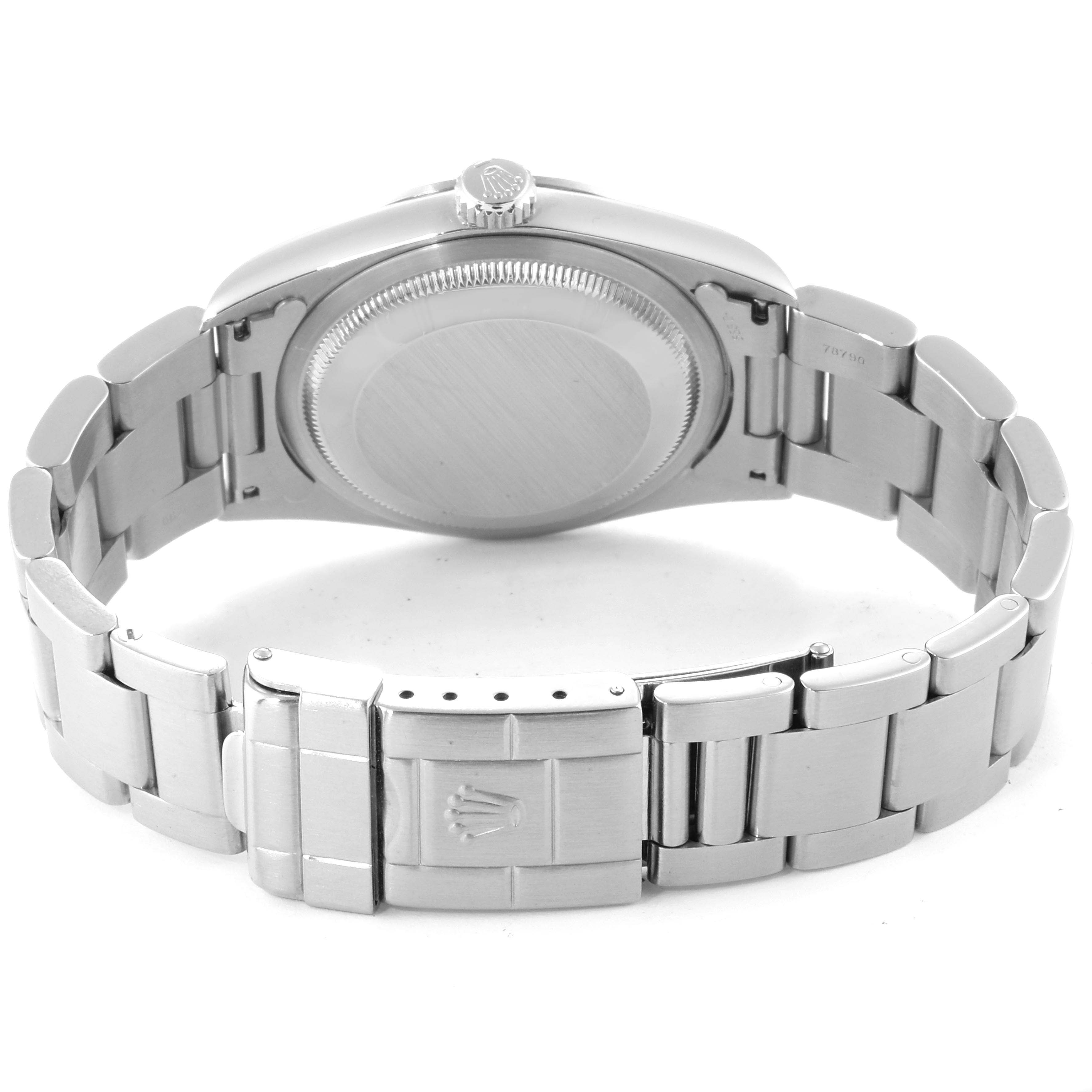 This image shows the back view of a Rolex Explorer 14270 Men
s Stainless Steel Black Dial 14270 Men
s Stainless Steel Black Dial watch, including its caseback, crown, and bracelet with the clasp.