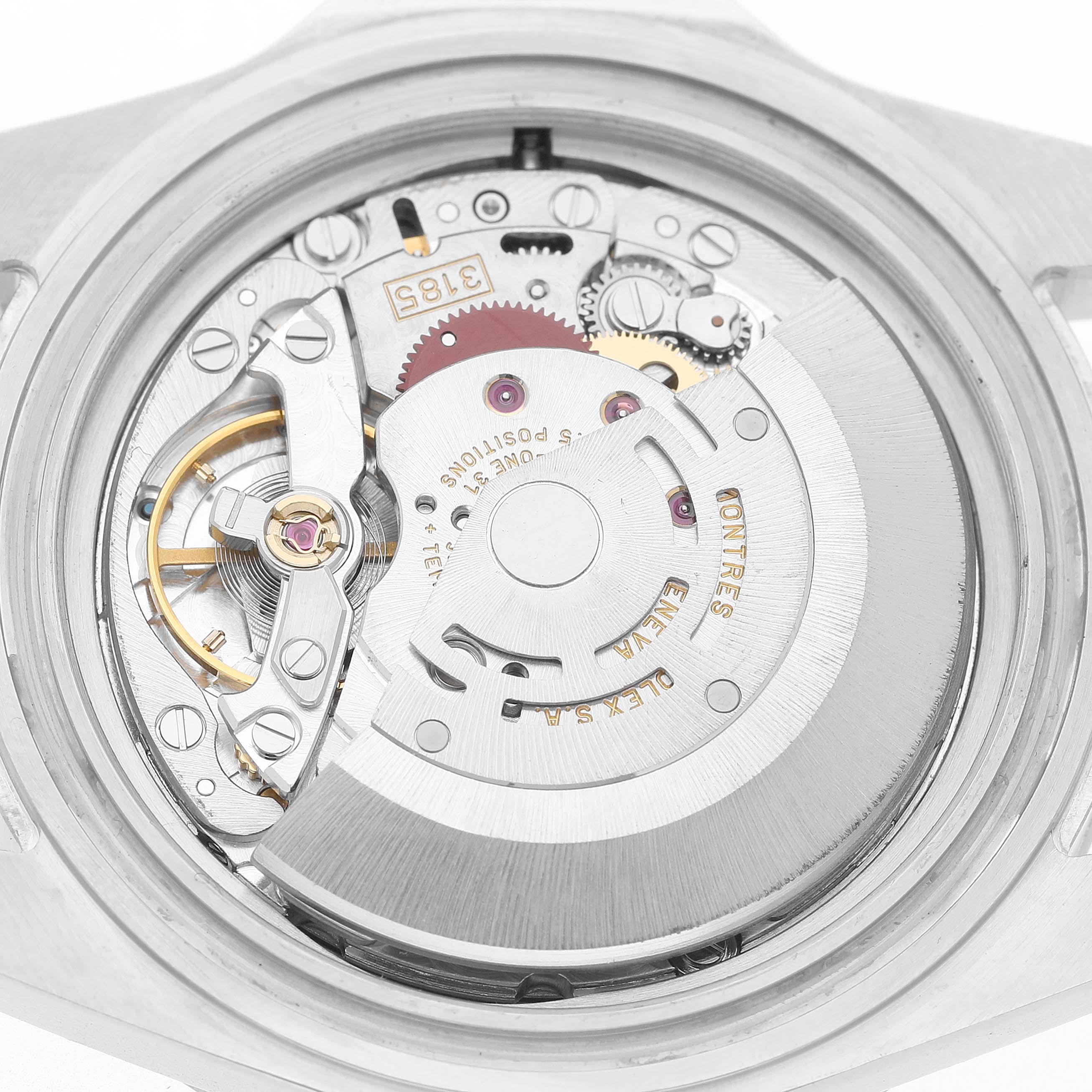 The image shows a close-up view of the movement inside the Rolex Explorer 16570 Men's Stainless Steel Black Dial watch, highlighting its intricate mechanical components.