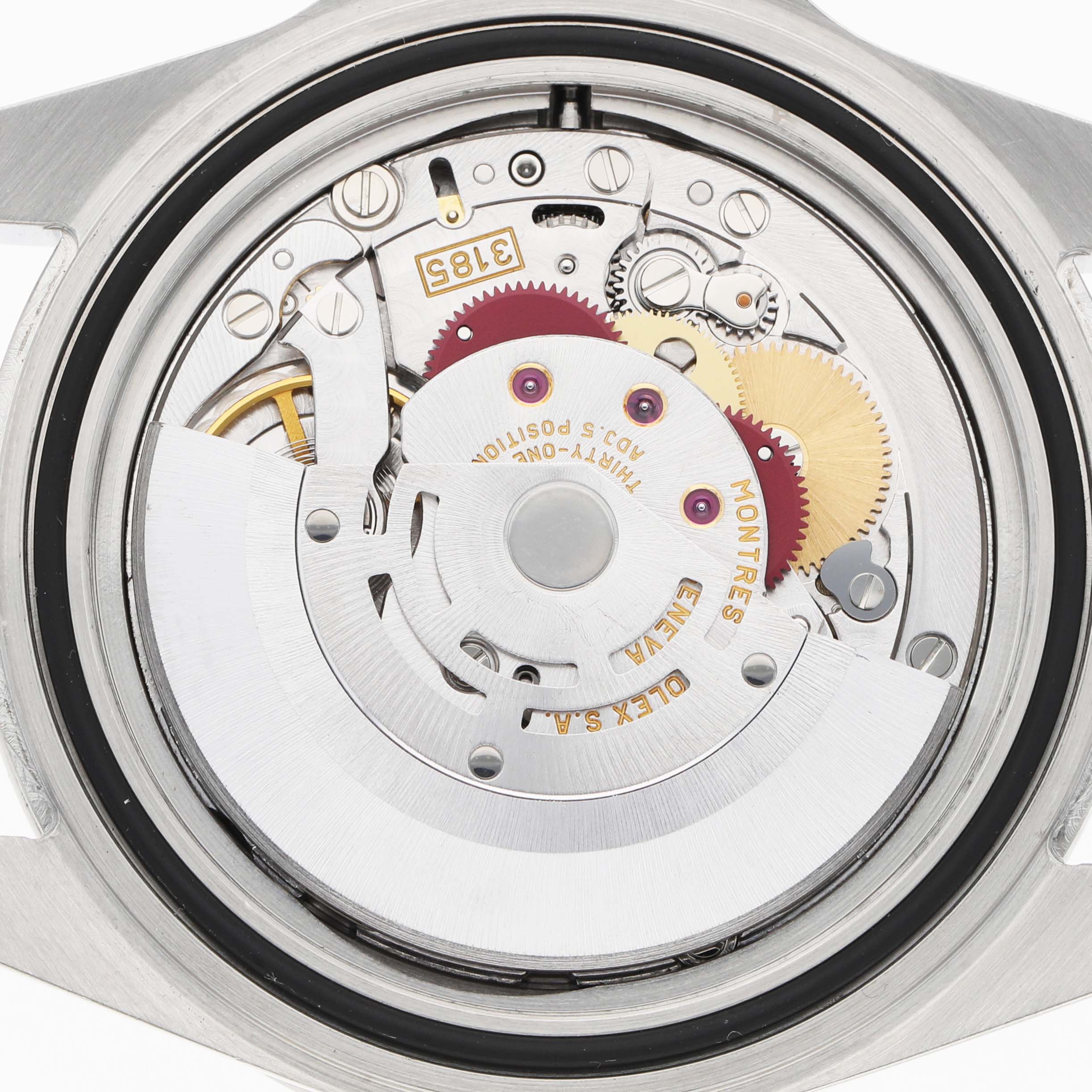 The image shows the internal mechanism of a Rolex Explorer 16570 Men's Stainless Steel White Dial watch from a back angle, highlighting gears and movement components.