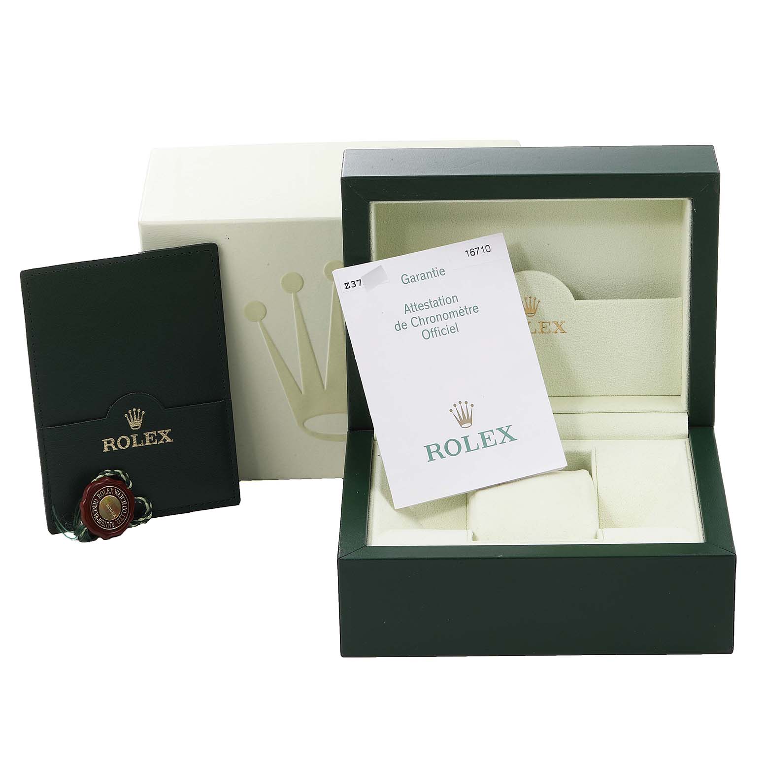 This image shows the packaging, warranty card, and accessories of a Rolex GMT-Master 16710 Men
s Stainless Steel Black Dial 16710 Men
s Stainless Steel Black Dial from a front angle.