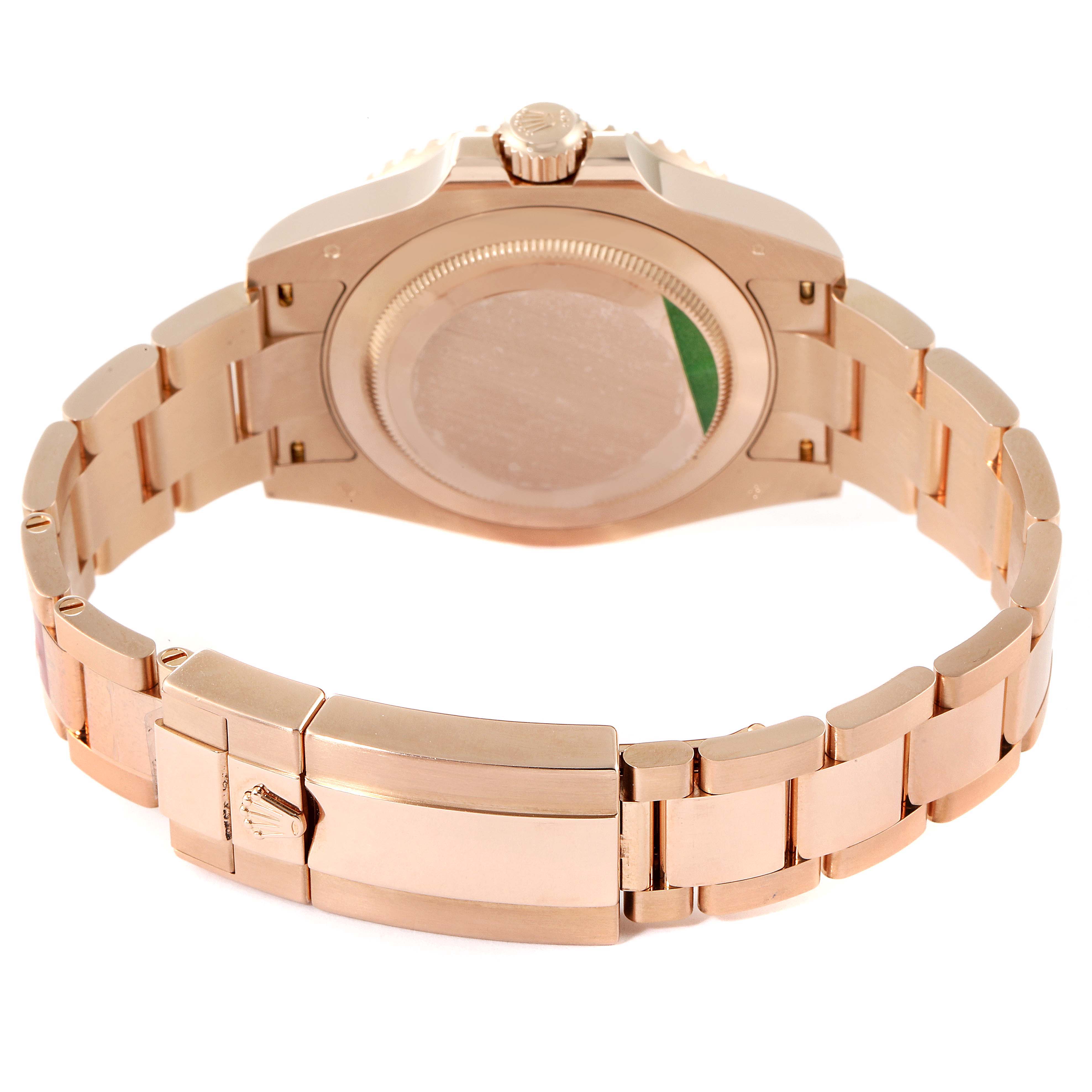 The image shows the back view of the Rolex GMT-Master 126715 Men's Rose Gold Black Dial 126715 Men's Rose Gold Black Dial watch, including its bracelet and clasp.