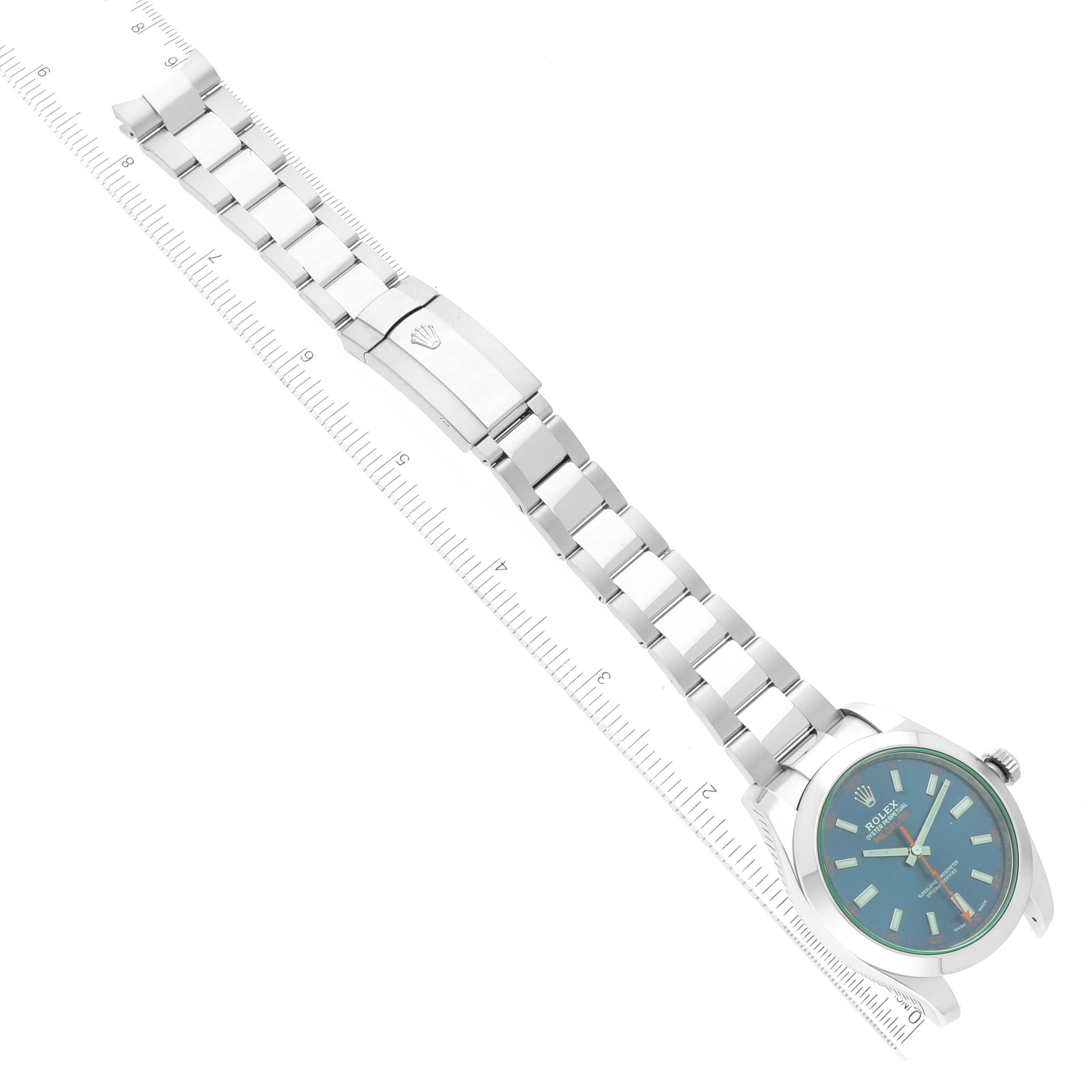 The image shows a Rolex Milgauss 116400GV Men's Stainless Steel Blue Dial 116400GV Men's Stainless Steel Blue Dial watch at an oblique angle, highlighting its turquoise dial, stainless steel bracelet, and clasp.