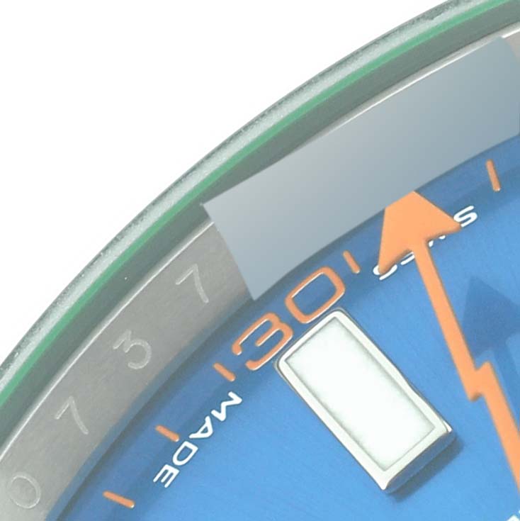 This image shows a close-up of the dial, indices, and part of the bezel of a Rolex Milgauss 116400GV Men's Stainless Steel Blue Dial 116400GV Men's Stainless Steel Blue Dial watch.