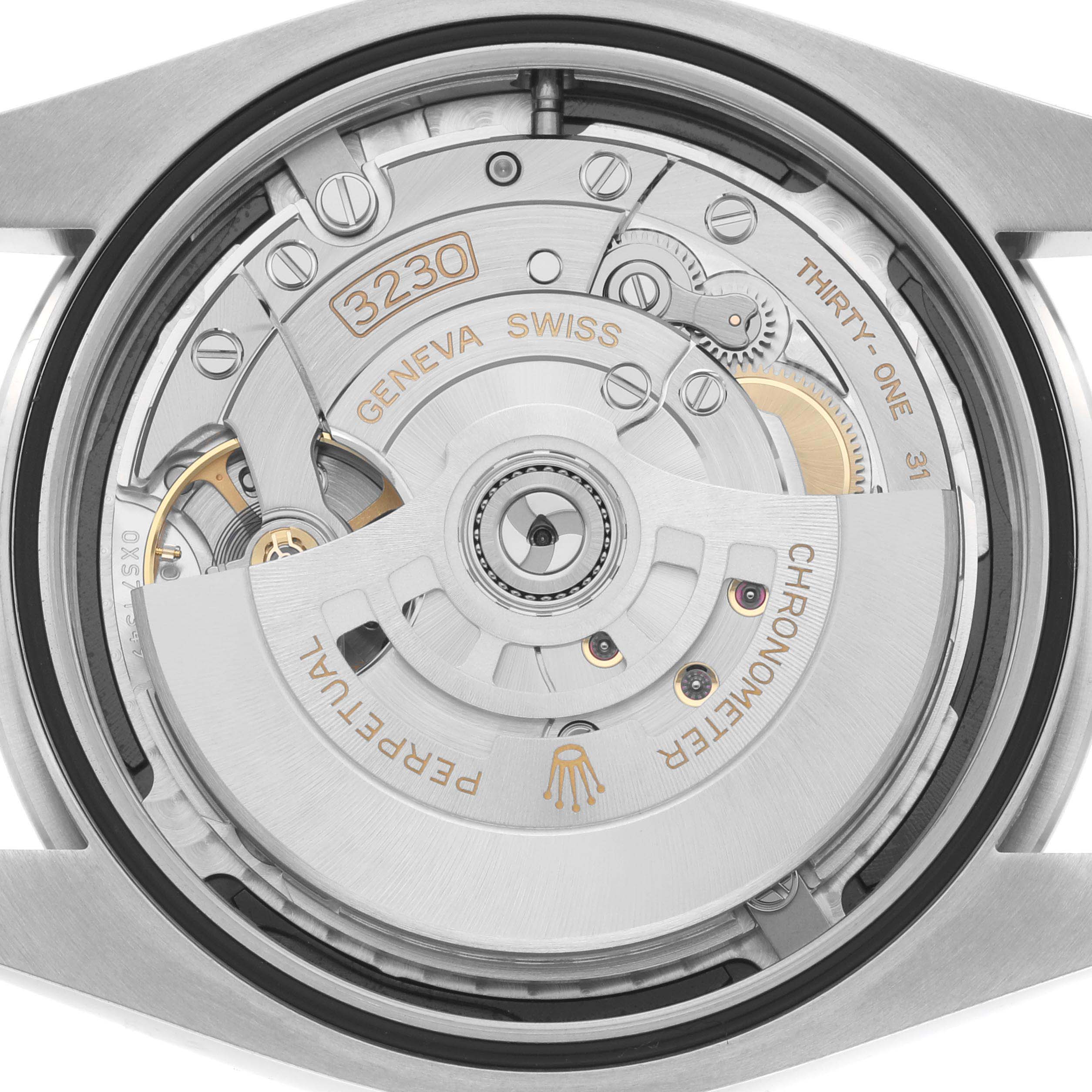 This image shows the internal mechanism and rotor of the Rolex Oyster Perpetual 124300 Men
s Stainless Steel Black Dial 124300 Men
s Stainless Steel Black Dial watch from a back or bottom angle.