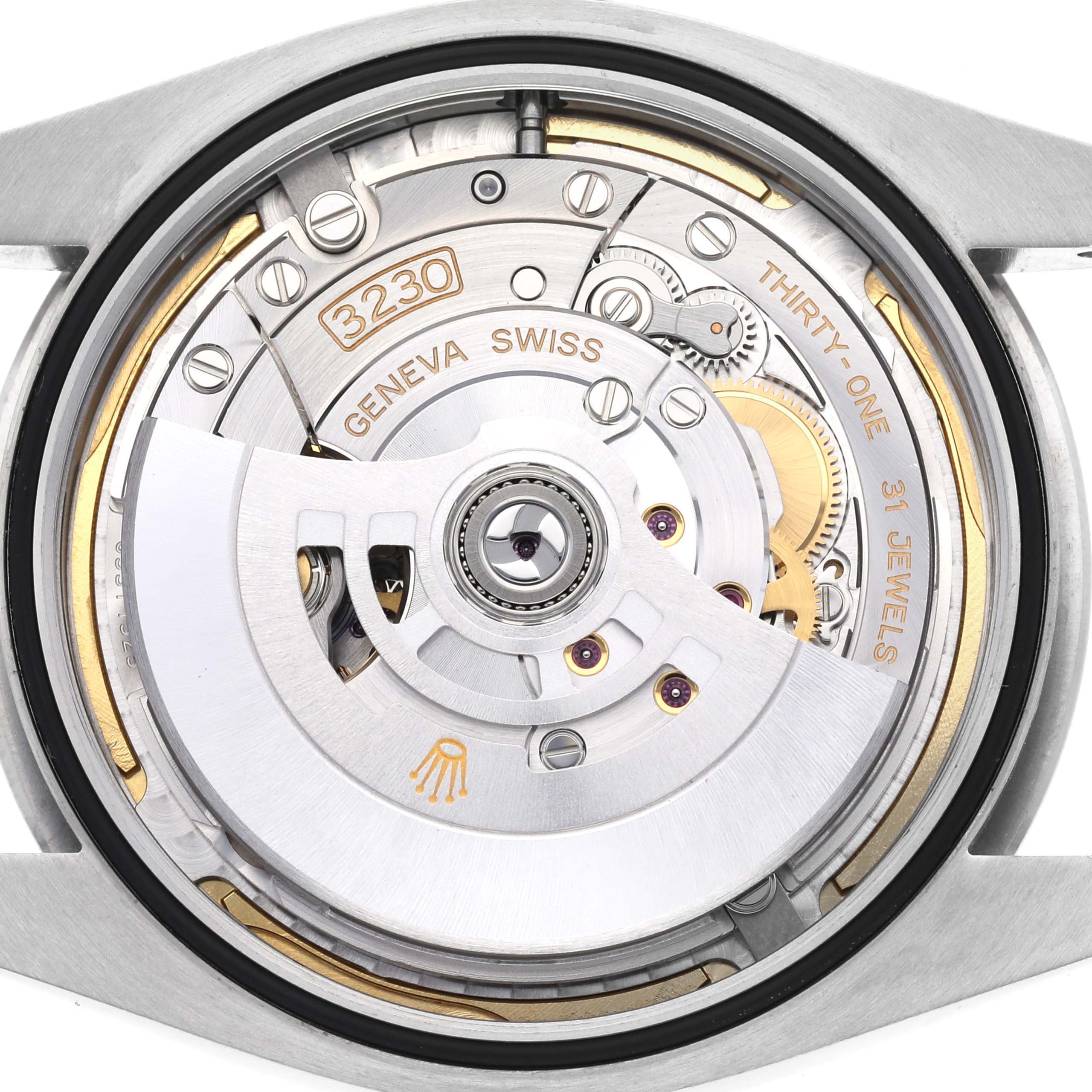 This image shows the movement mechanism of a Rolex Oyster Perpetual 124300 Men's Stainless Steel Blue Dial 124300 Men's Stainless Steel Blue Dial model, including gears and the rotor.