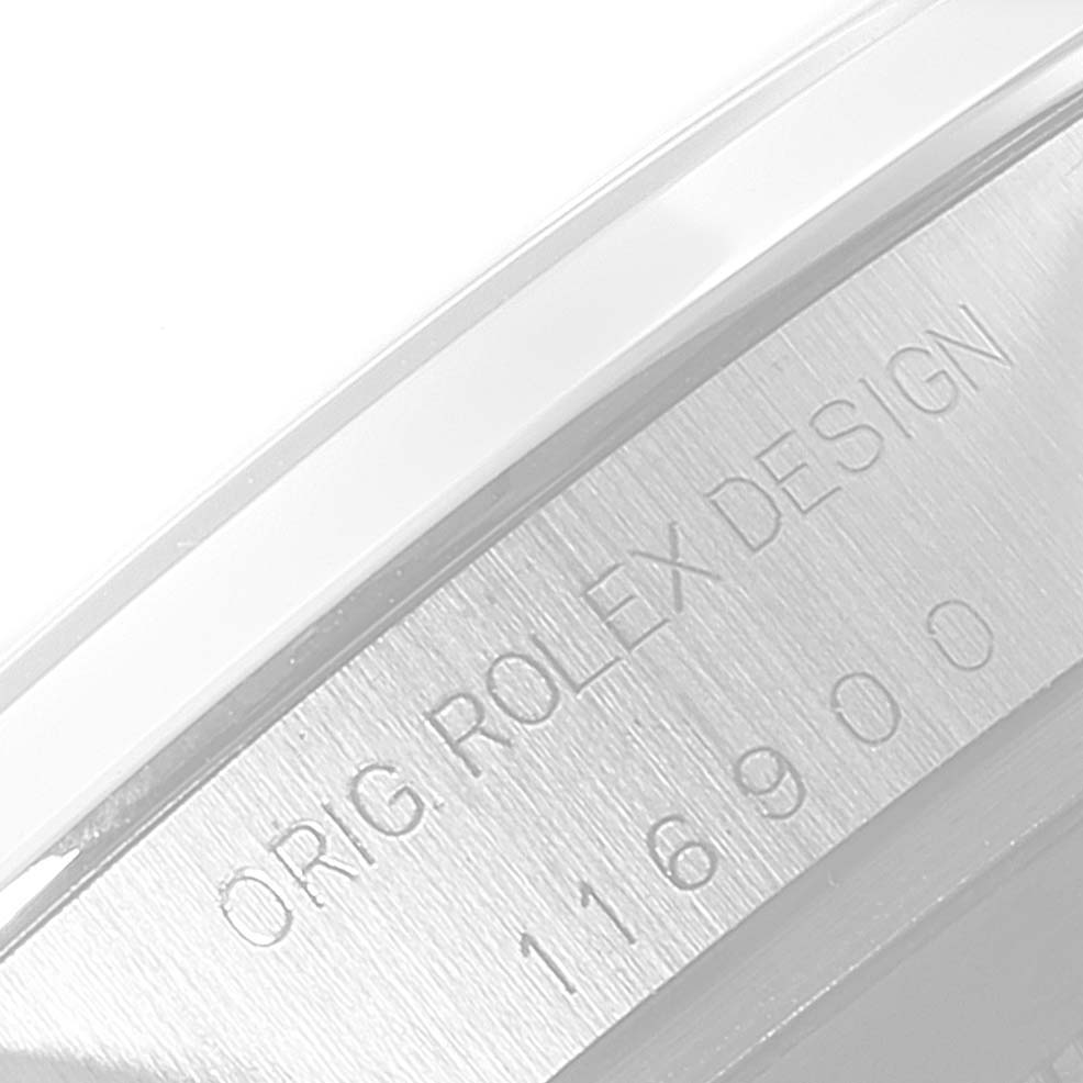 The image shows a close-up of the engraved text on the case of the Rolex Air-King 116900 Men's Stainless Steel Black Dial 116900 Men's Stainless Steel Black Dial watch.