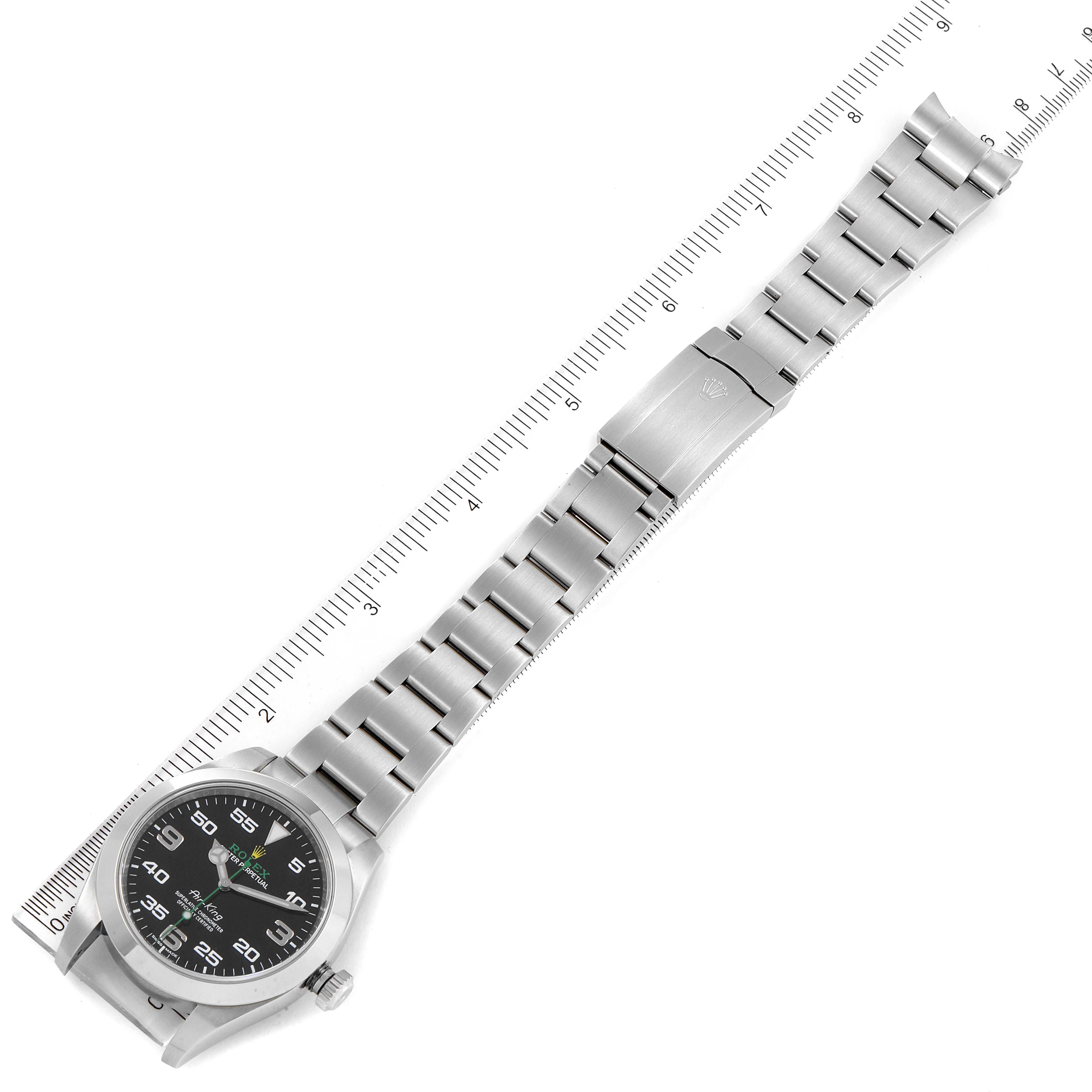 The image shows an overhead view of a Rolex Air-King 116900 Men's Stainless Steel Black Dial 116900 Men's Stainless Steel Black Dial watch, displaying the face, bezel, crown, and entire bracelet.