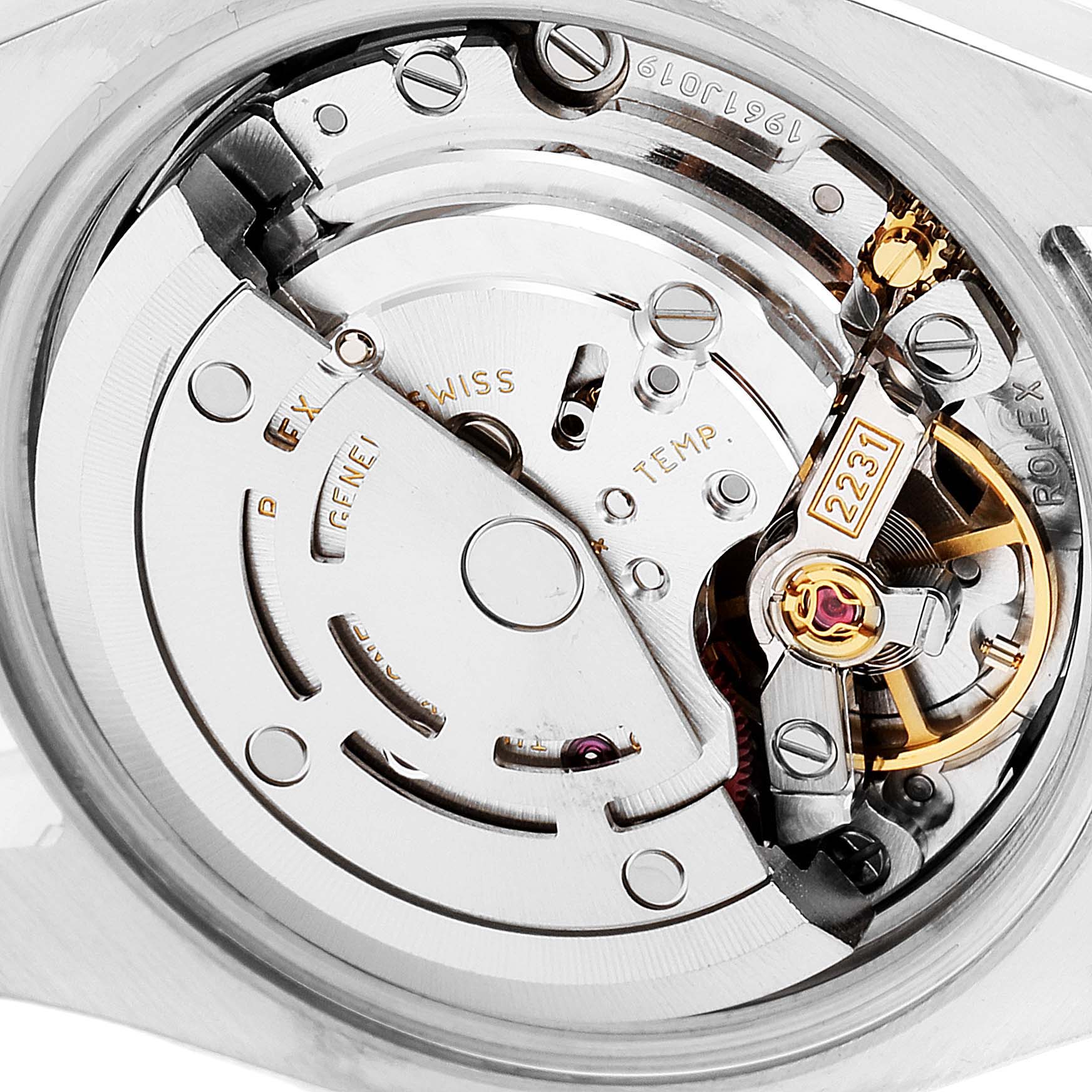 Close-up view of the Rolex Oyster Perpetual 176200 Women's Stainless Steel Black Dial 176200 Women's Stainless Steel Black Dial movement mechanism, highlighting intricate inner components.