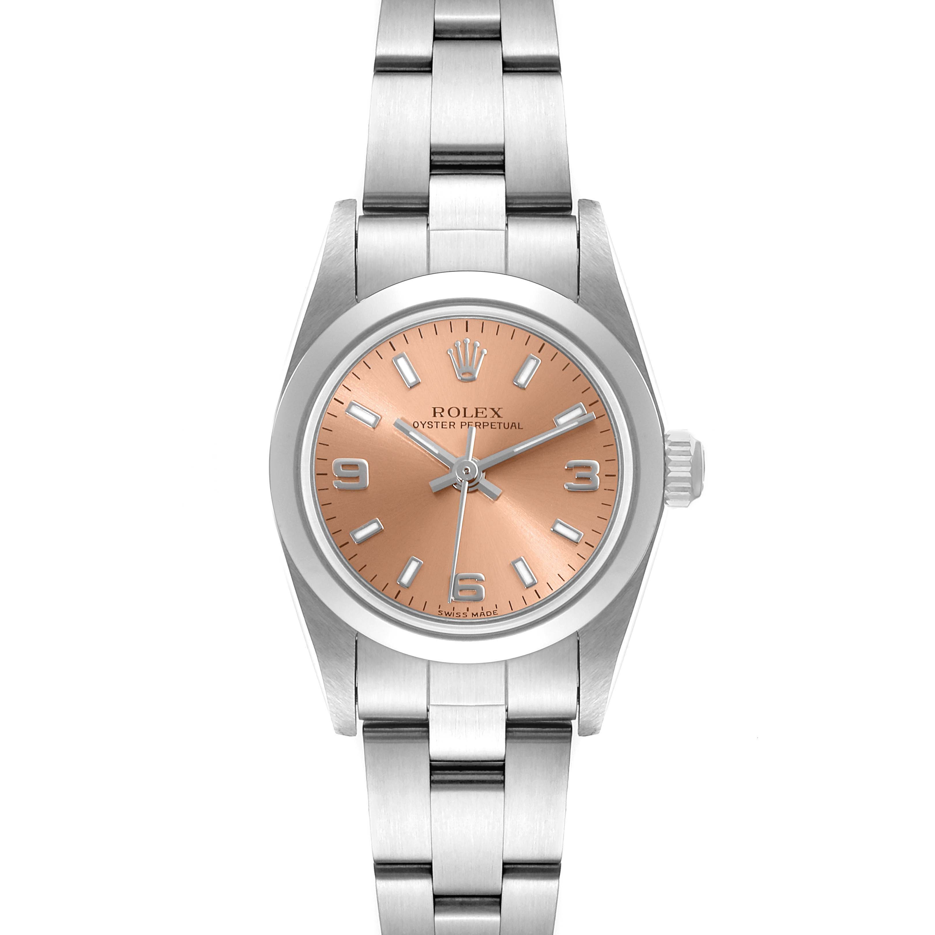 The image shows a Rolex Oyster Perpetual 76080 Women's Stainless Steel Pink Dial 76080 Women's Stainless Steel Pink Dial model watch from a top-down angle, highlighting the dial, hands, crown, and bracelet.