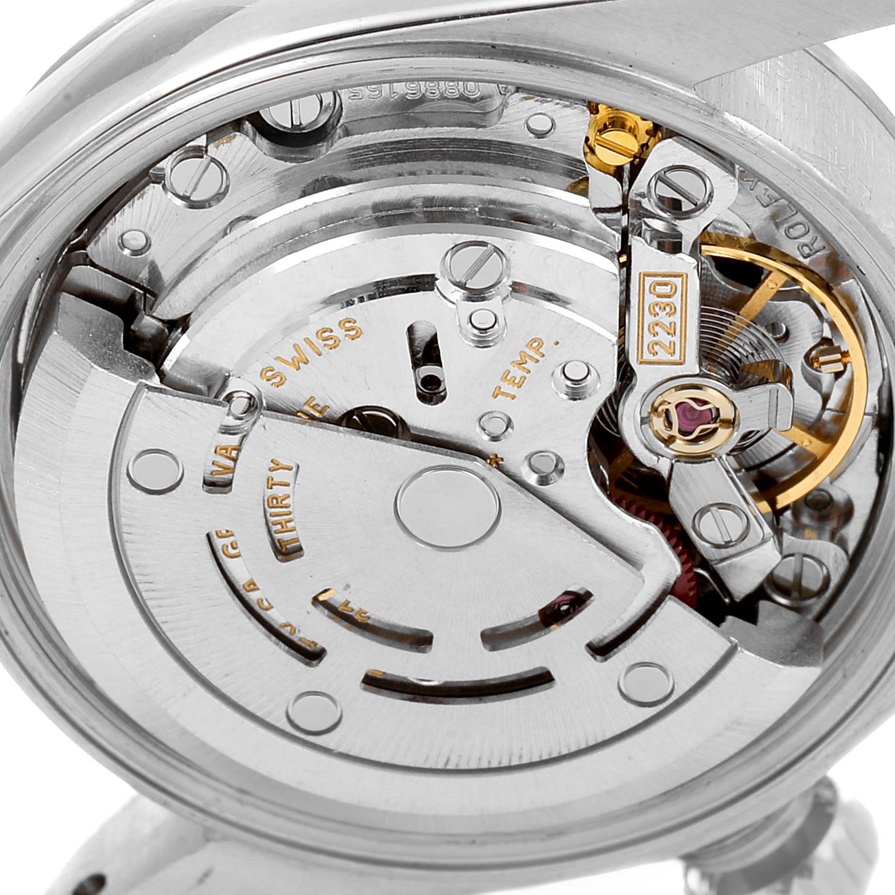 The image shows a close-up view of the movement and internal mechanics of a Rolex Oyster Perpetual 76080 Women's Stainless Steel Pink Dial 76080 Women's Stainless Steel Pink Dial watch.