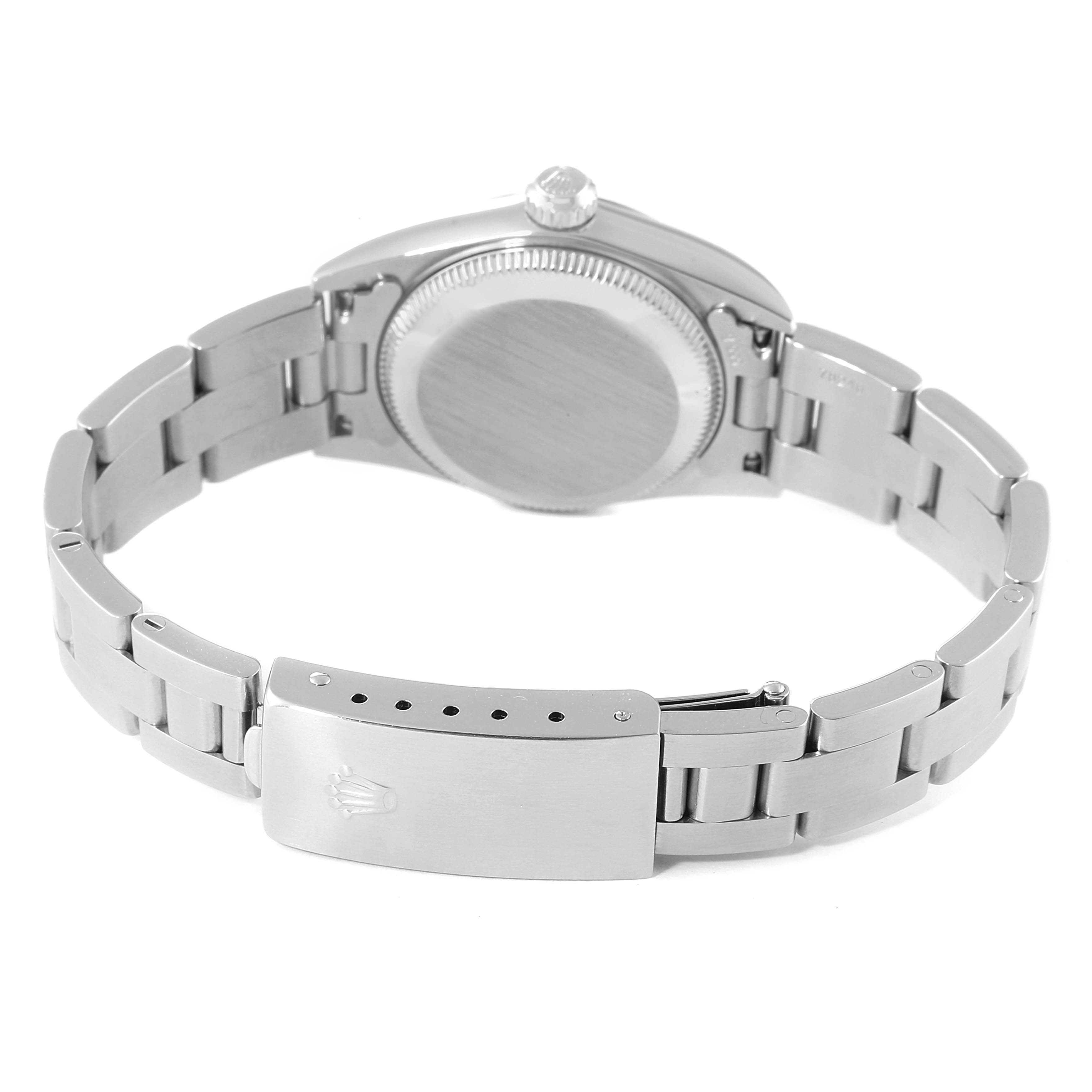 The image shows a Rolex Oyster Perpetual 76080 Women's Stainless Steel Pink Dial 76080 Women's Stainless Steel Pink Dial watch from the rear view, highlighting the clasp, bracelet, and case back.