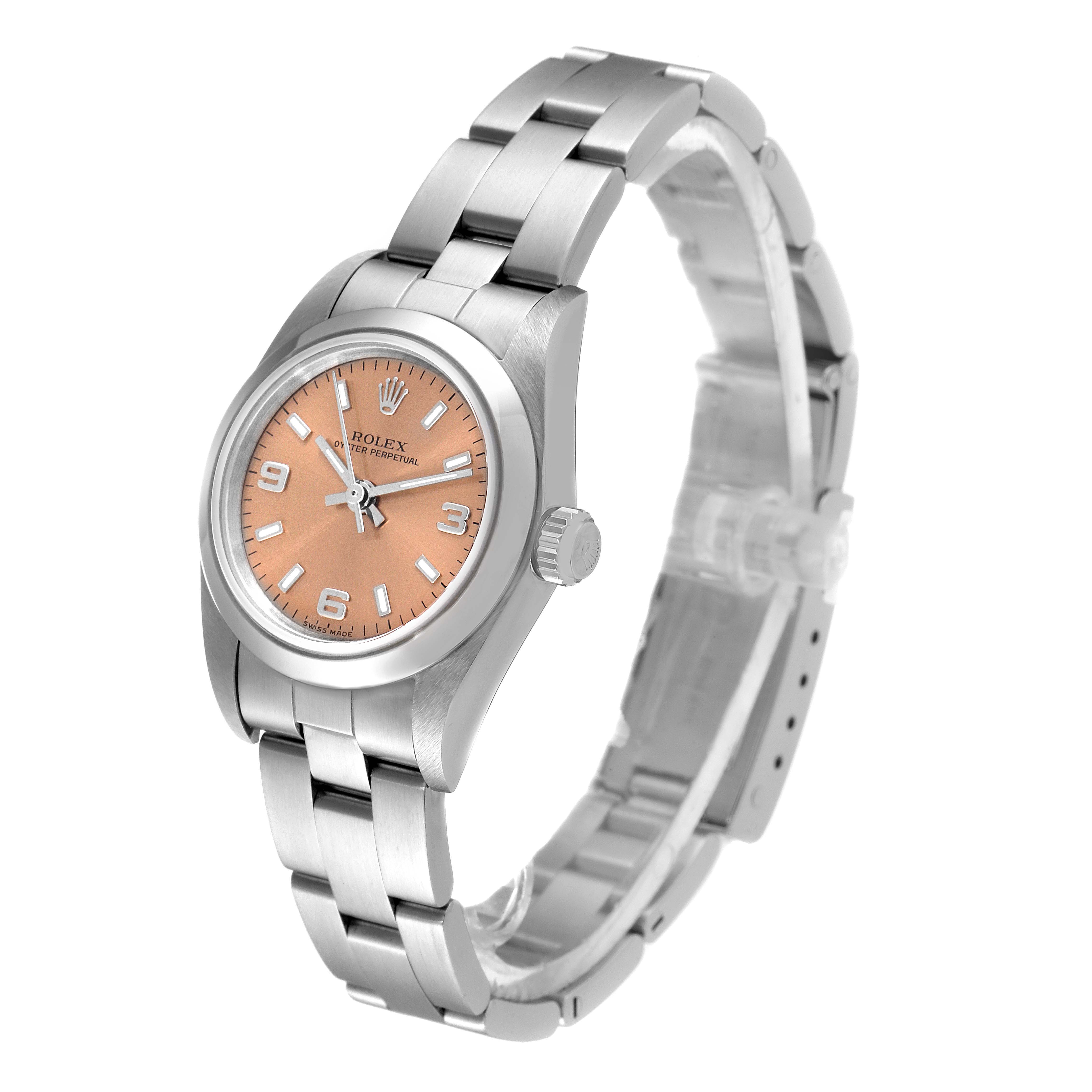 The image shows a Rolex Oyster Perpetual 76080 Women's Stainless Steel Pink Dial 76080 Women's Stainless Steel Pink Dial watch in a three-quarter view, highlighting its bracelet, face, and crown.