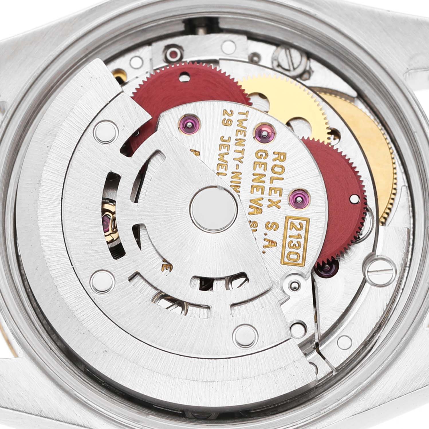 The image shows the movement of a Rolex Datejust 67193 Men's Steel and Gold (two tone) Champagne Dial watch, viewed from the back, highlighting its rotor and gears.