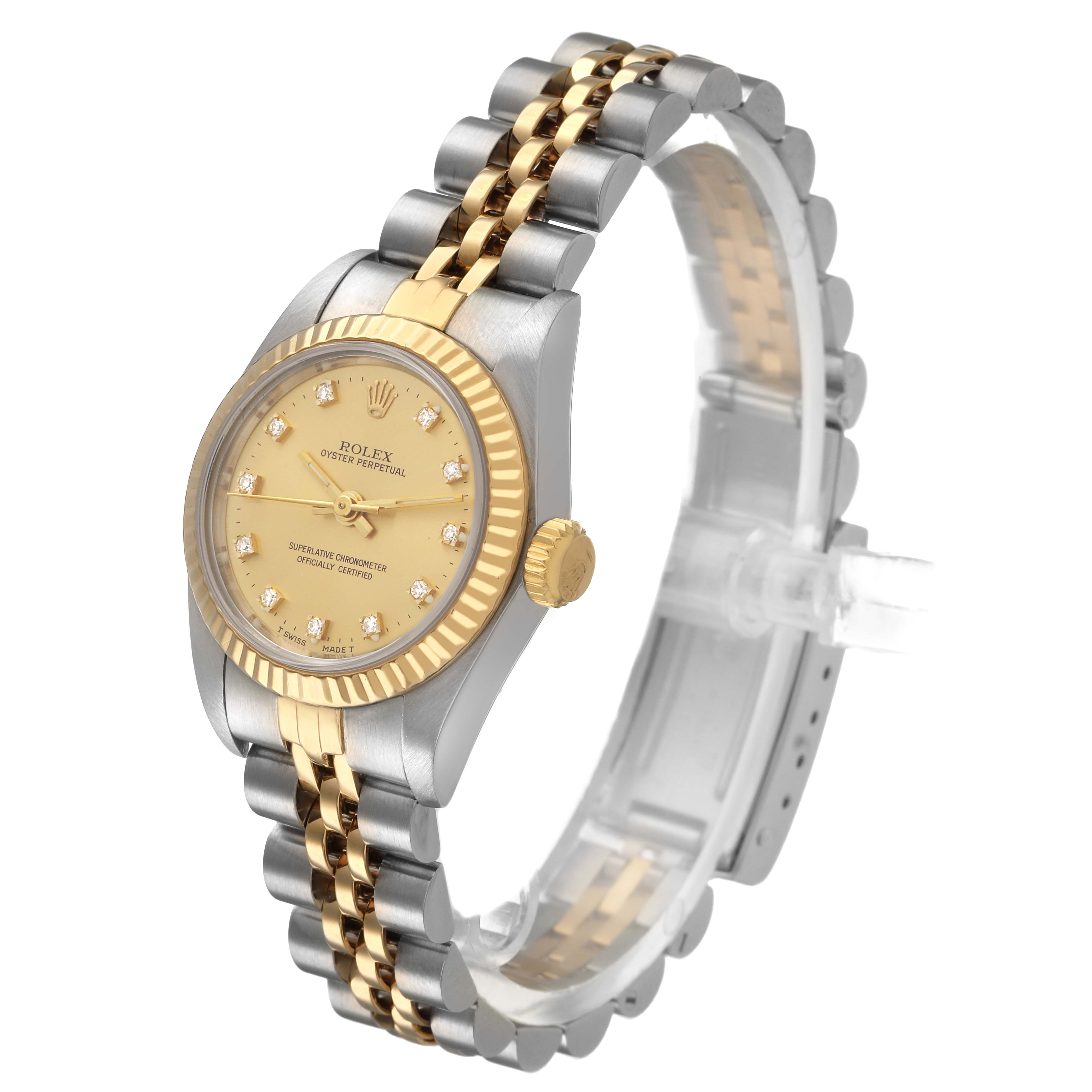 The Rolex Datejust 67193 Men's Steel and Gold (two tone) Champagne Dial watch is shown at a three-quarter angle displaying its gold dial, bezel, crown, and two-tone bracelet.