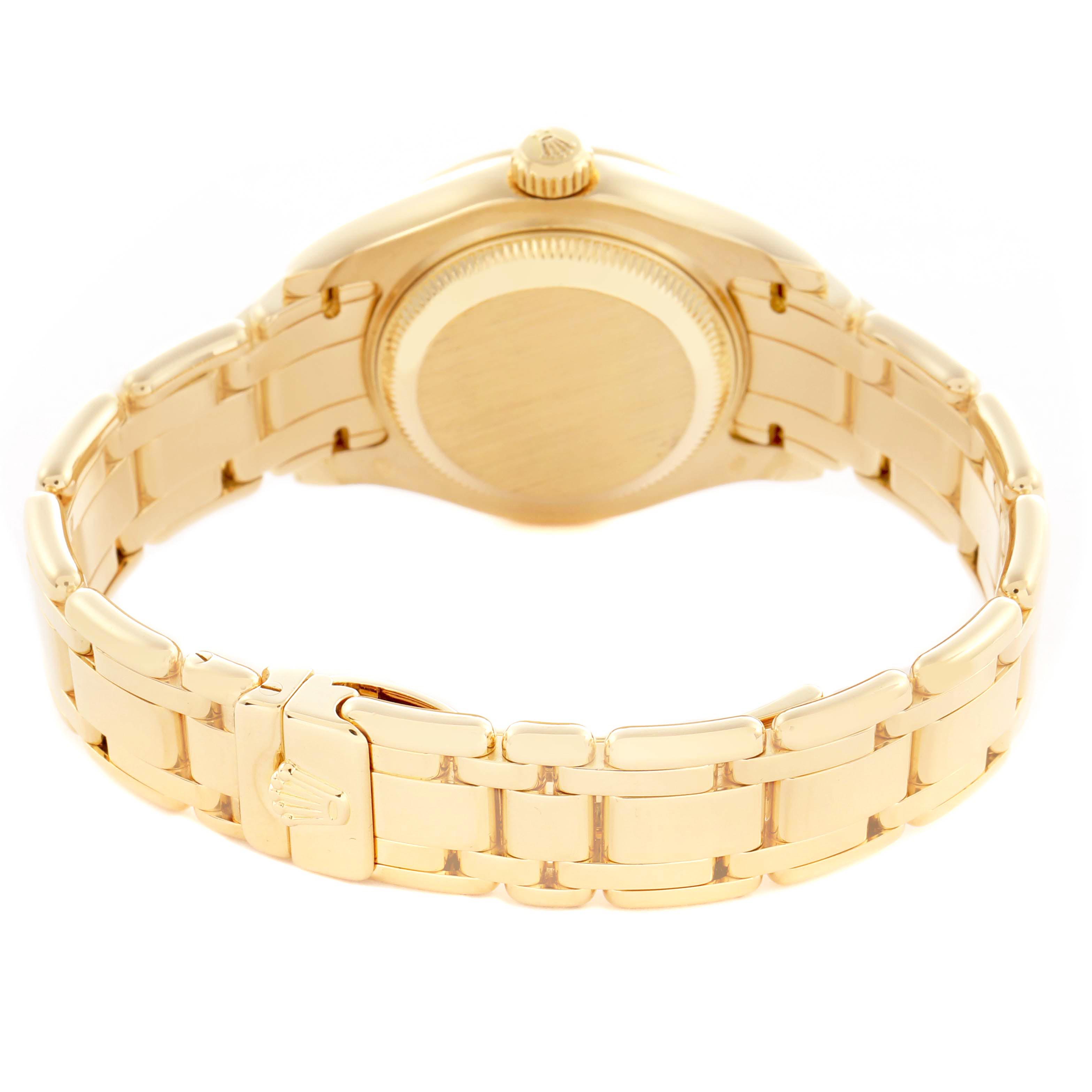 The image shows the back and bracelet of a Rolex Pearlmaster 69318 Women
s Yellow Gold White Dial 69318 Women
s Yellow Gold White Dial watch, highlighting the clasp and case back at a rear angle.