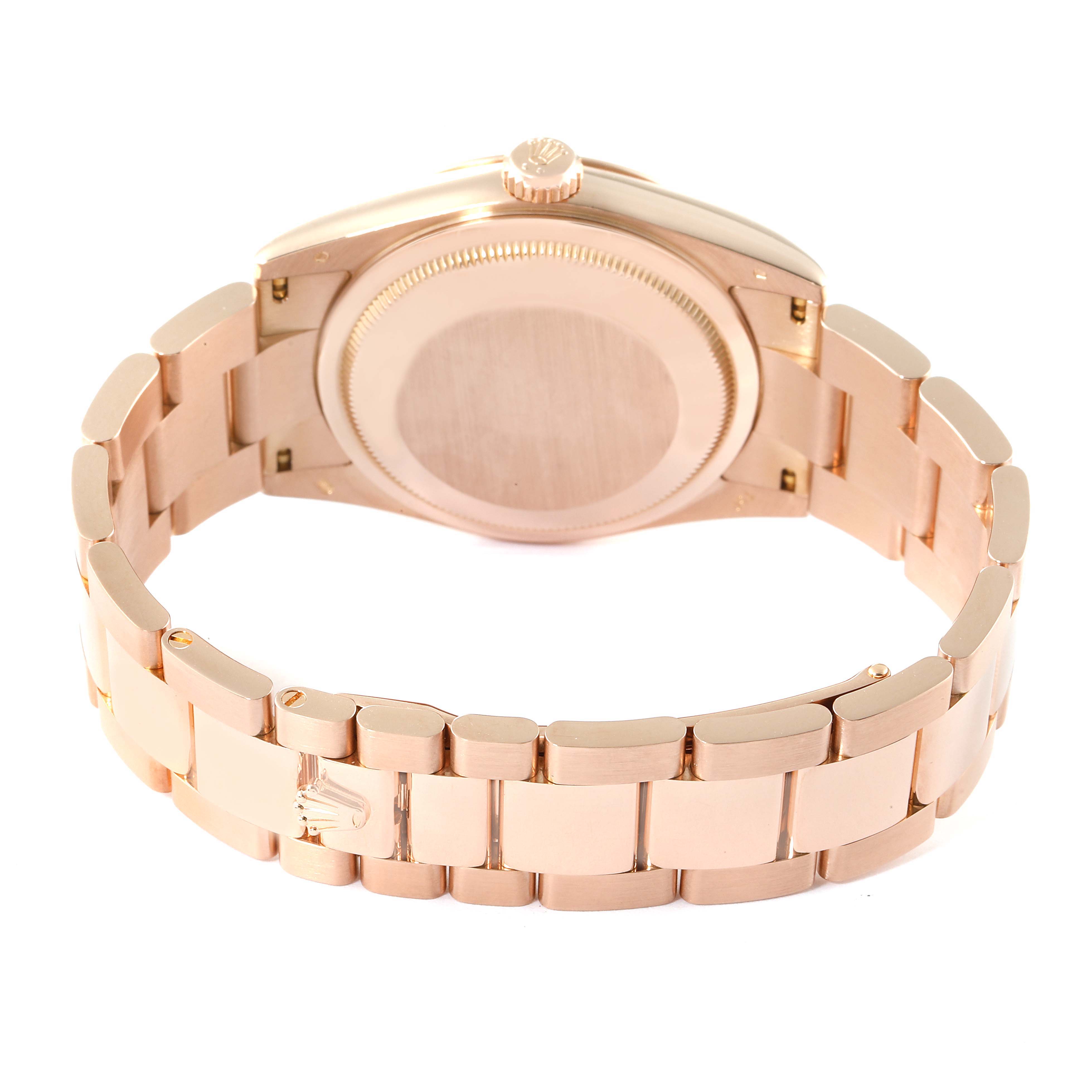 The image shows the back of the Rolex President 118205 Men's Rose Gold Pink Dial 118205 Men's Rose Gold Pink Dial watch, emphasizing the case, crown, and bracelet.