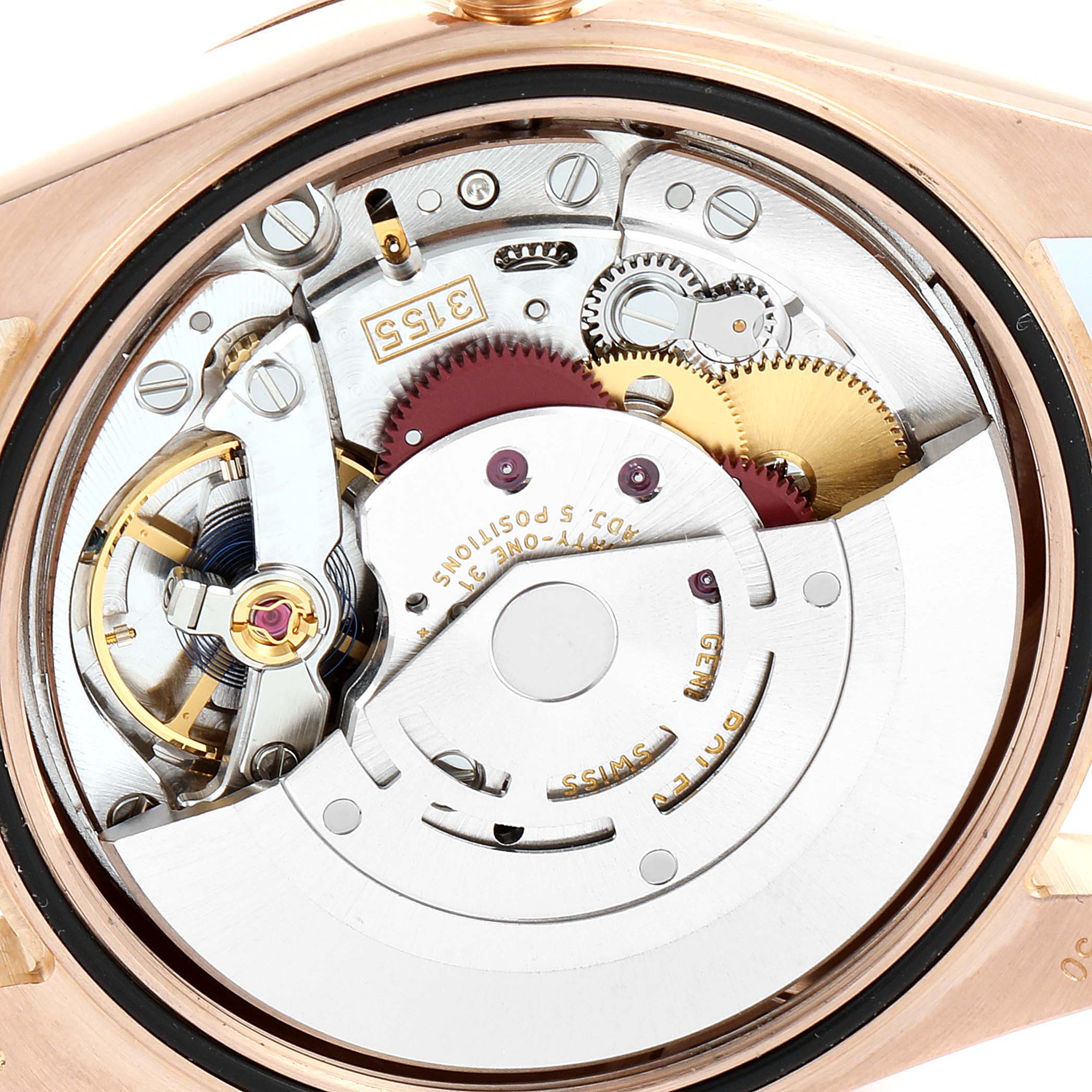 The image shows the internal mechanical movement of a Rolex President 118205 Men's Rose Gold Pink Dial 118205 Men's Rose Gold Pink Dial model watch from the back angle.