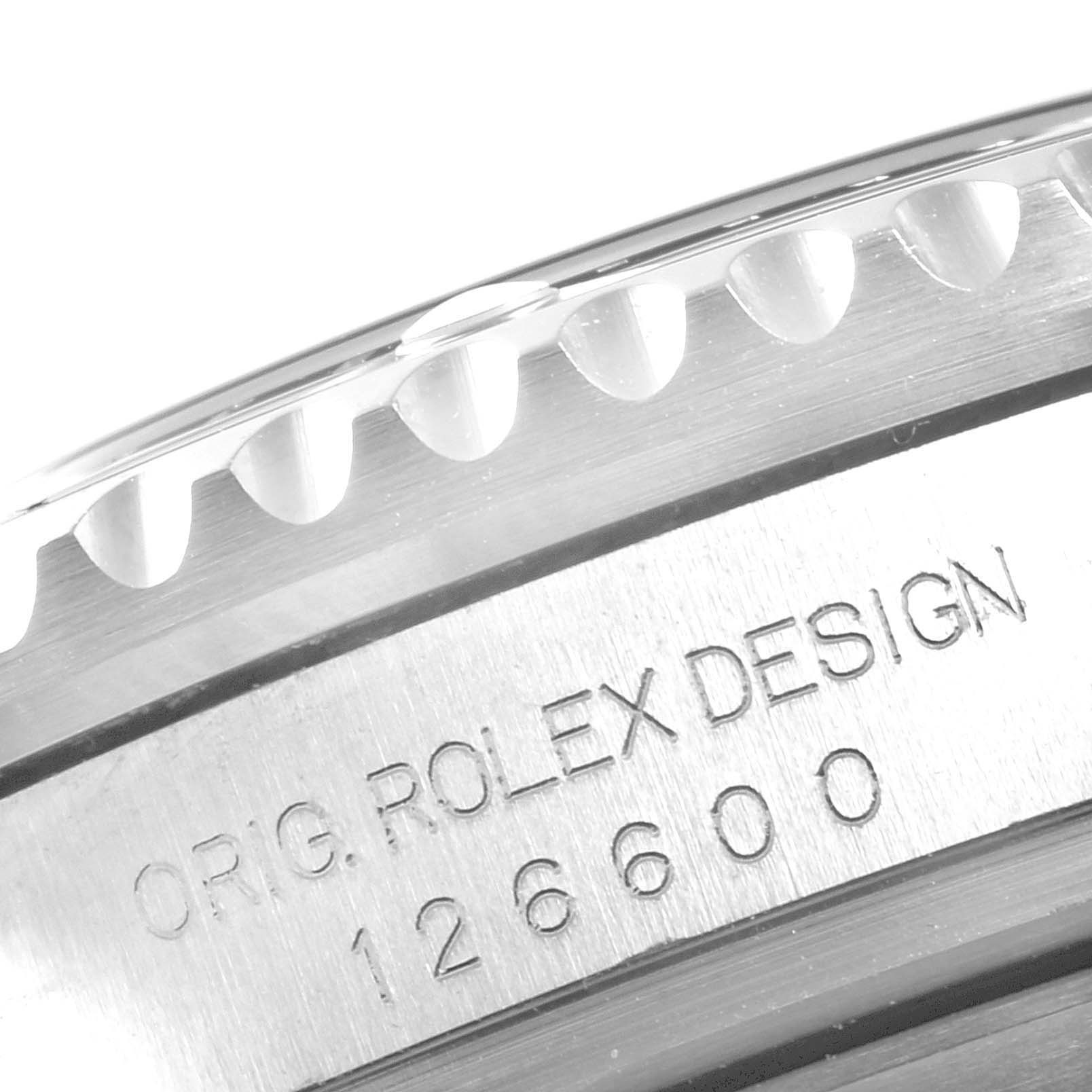 This image shows a close-up of the bezel edge and the case side with the model number engraving of a Rolex Sea-Dweller 126600 Men
s Stainless Steel Black Dial 126600 Men
s Stainless Steel Black Dial watch.