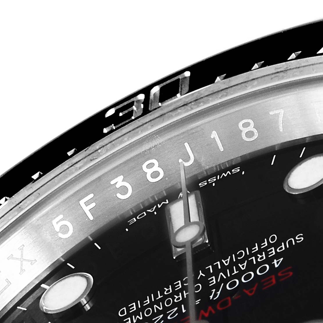 This close-up image shows the dial and bezel of the Rolex Sea-Dweller 126600 Men
s Stainless Steel Black Dial 126600 Men
s Stainless Steel Black Dial watch, highlighting the markings and part of the minute hand.