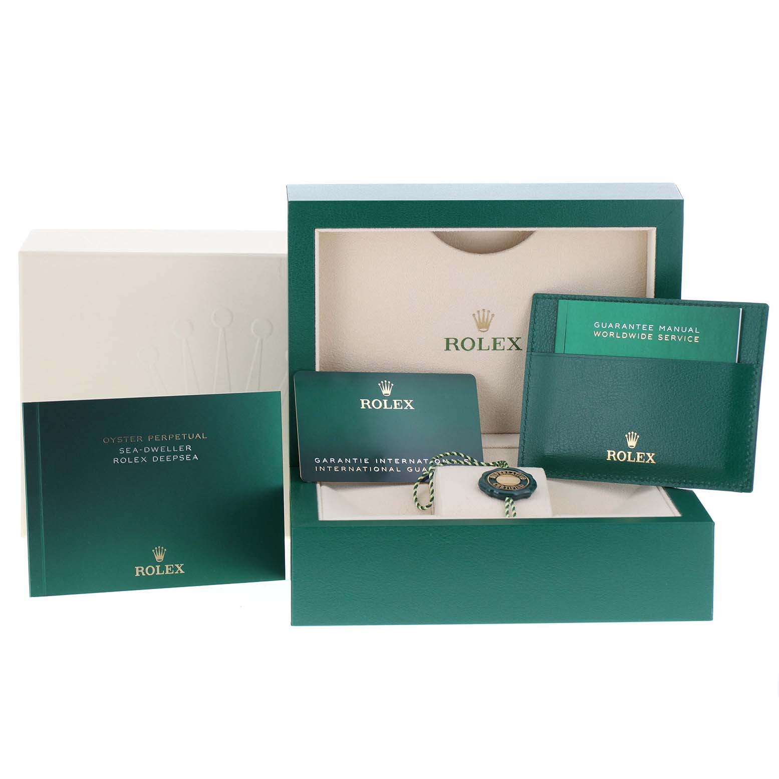 The image shows the packaging and accessories for the Rolex Sea-Dweller 126603 Men's Steel and Gold (two tone) Black Dial 126603 Men's Steel and Gold (two tone) Black Dial model, including the box, warranty card, and manuals.