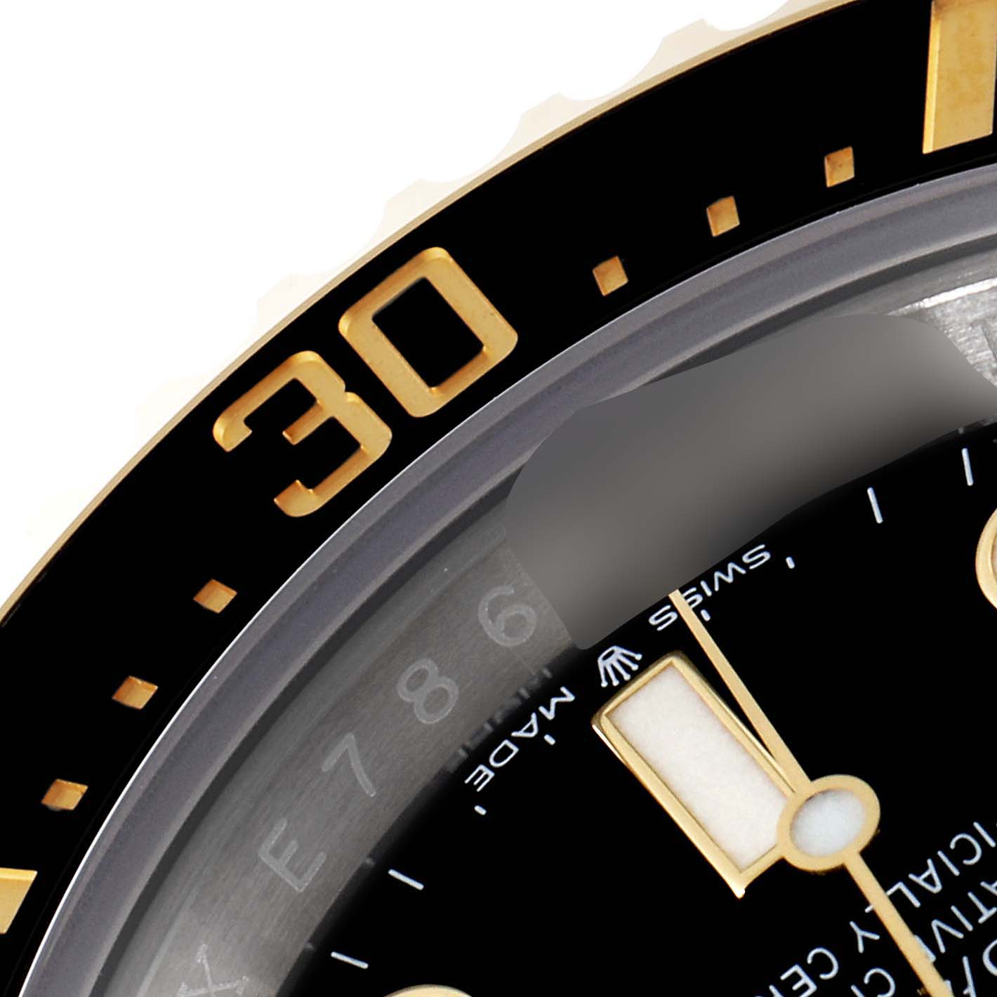 This close-up image shows the bezel and part of the dial of a Rolex Sea-Dweller 126603 Men's Steel and Gold (two tone) Black Dial 126603 Men's Steel and Gold (two tone) Black Dial watch.