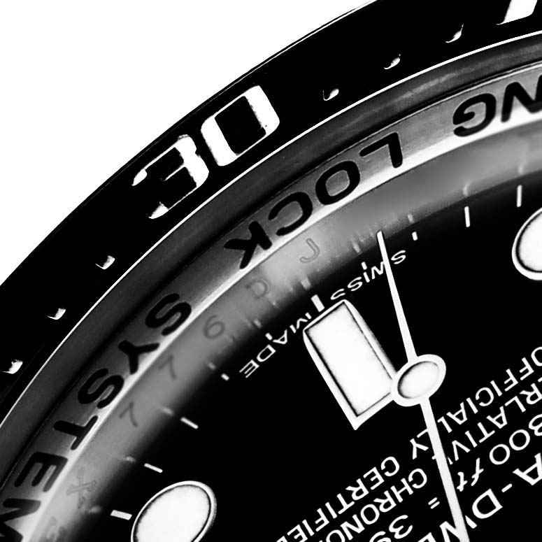 The close-up angle of the Rolex Sea-Dweller 116660 Men
s Stainless Steel Black Dial 116660 Men
s Stainless Steel Black Dial shows the bezel, partial dial, and "Swiss Made" text.