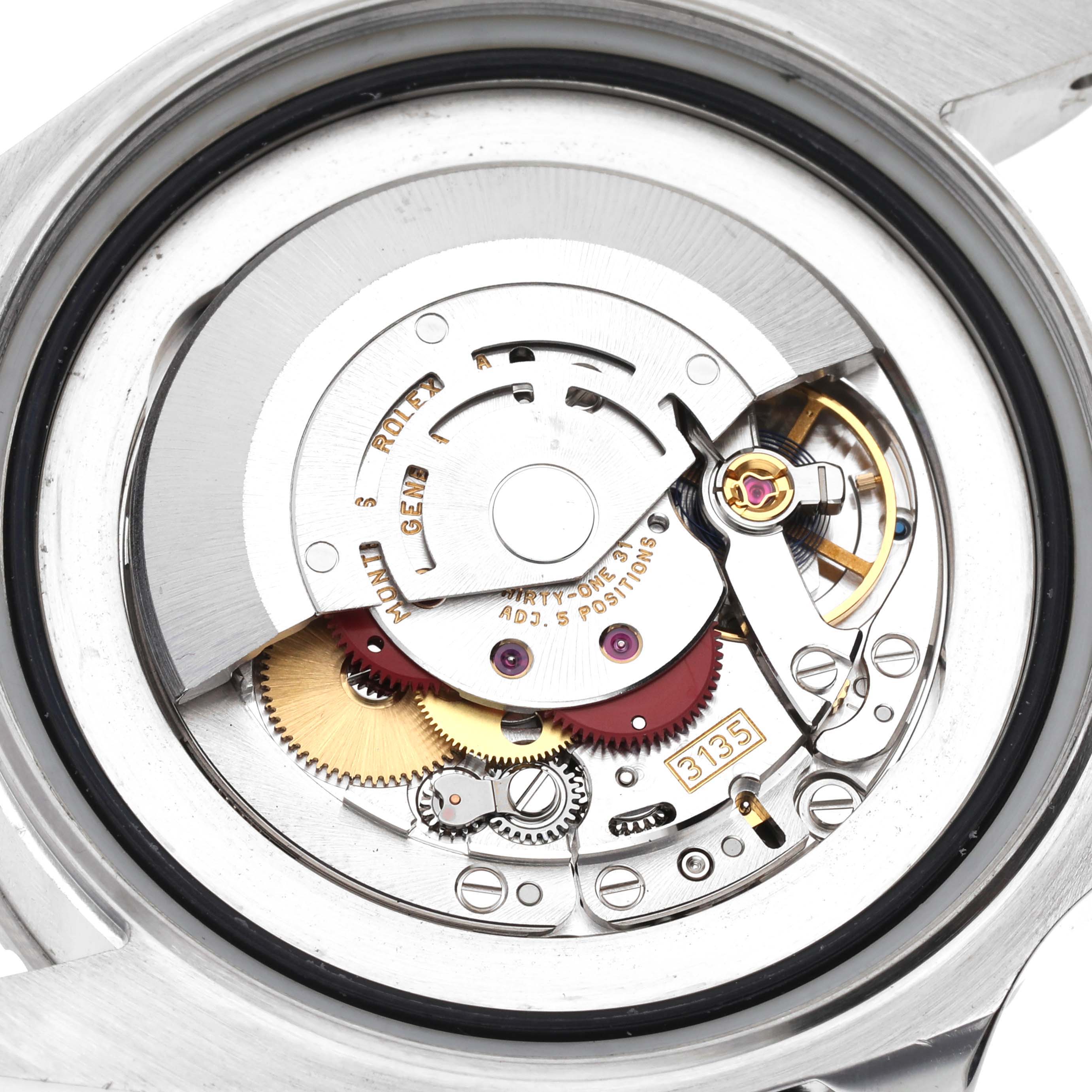 The image shows the open back and intricate inner movement of a Rolex Sea-Dweller 116660 Men
s Stainless Steel Black Dial 116660 Men
s Stainless Steel Black Dial watch.