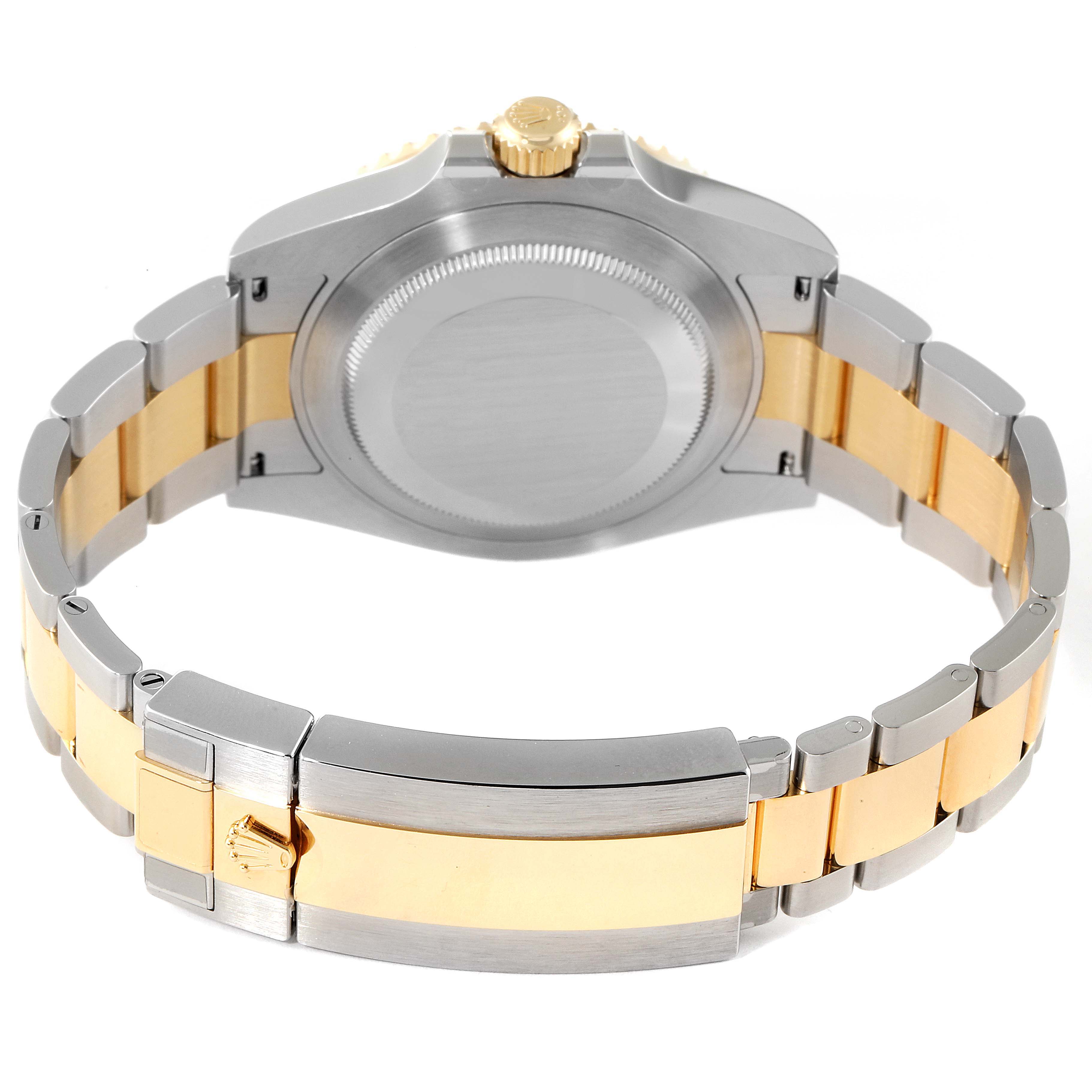 The image shows the back case and bracelet of the Rolex Submariner 126613 Men's Steel and Gold (two tone) Blue Dial 126613 Men's Steel and Gold (two tone) Blue Dial watch, highlighting the two-tone metal design.