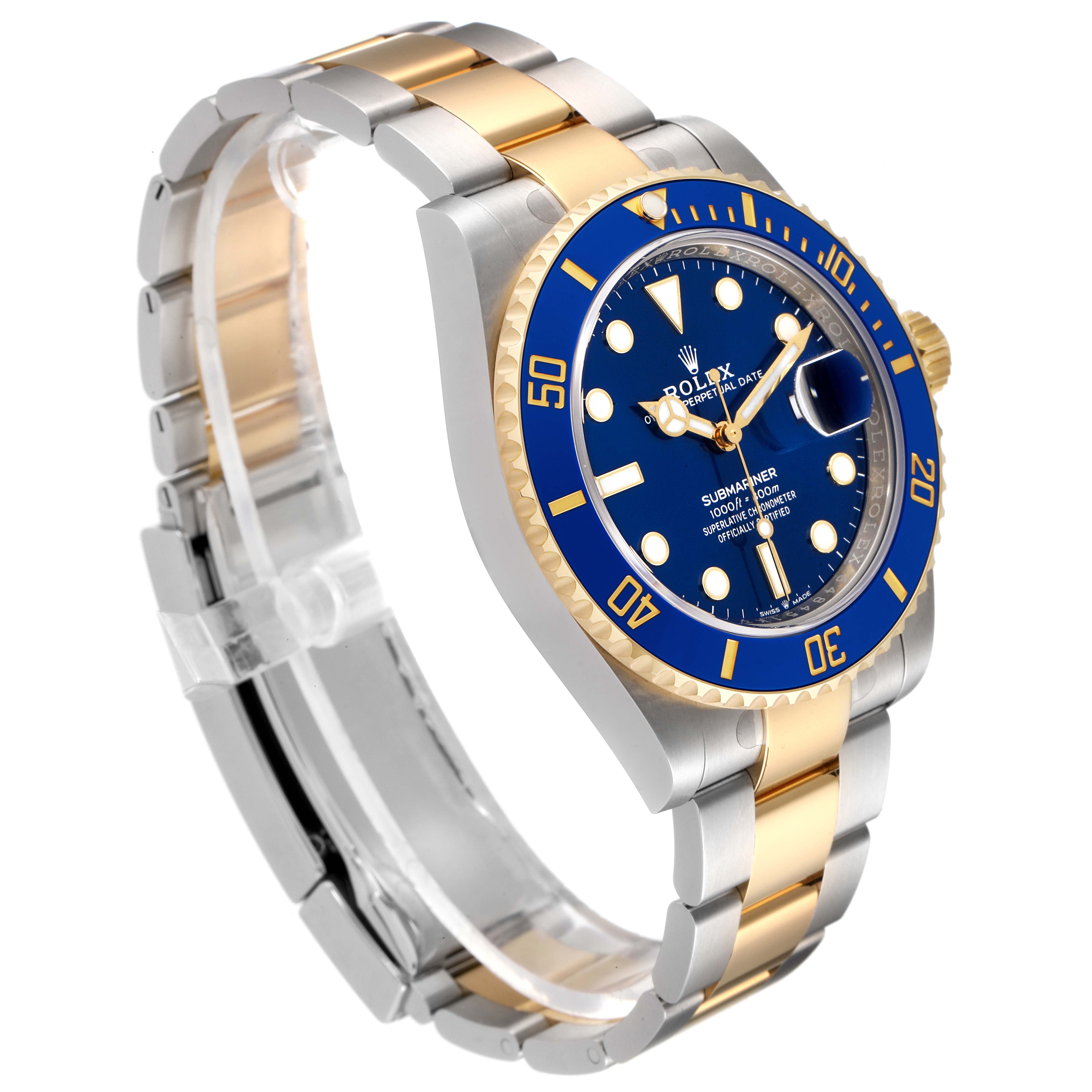 The image shows a Rolex Submariner 126613 Men's Steel and Gold (two tone) Blue Dial 126613 Men's Steel and Gold (two tone) Blue Dial watch at a three-quarter angle, highlighting the blue dial, bezel, and two-tone bracelet.