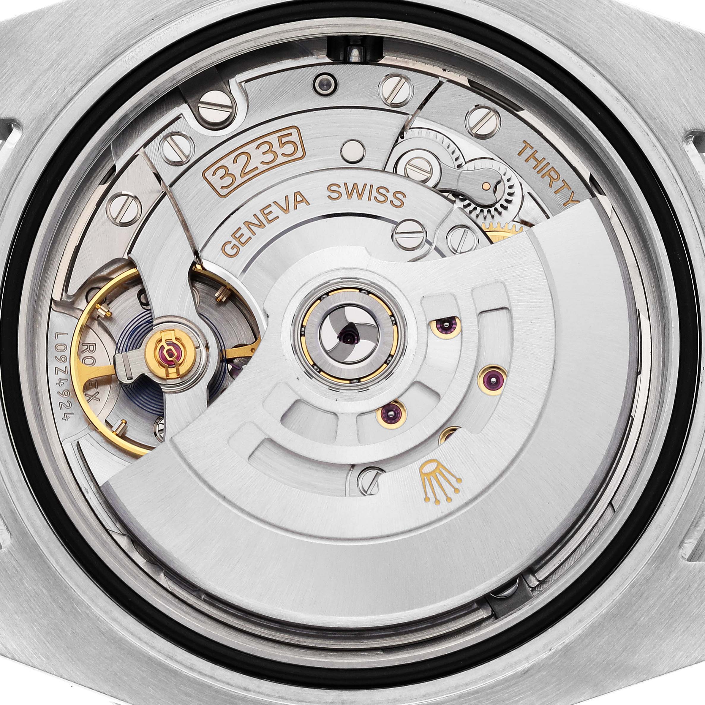 This image shows the movement mechanism of a Rolex Submariner 126610LN Men
s Stainless Steel Black Dial 126610LN Men
s Stainless Steel Black Dial, model 3235, viewed from the back.