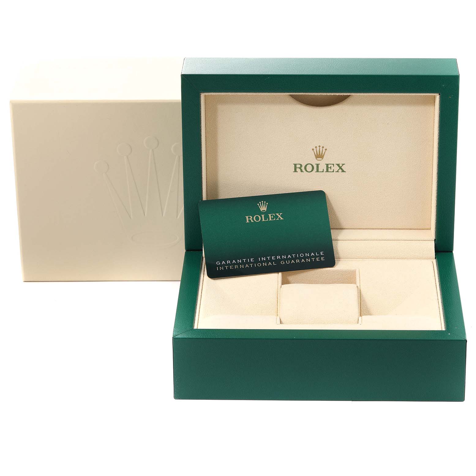 The image shows the packaging box and international guarantee card for the Submariner model by Rolex.