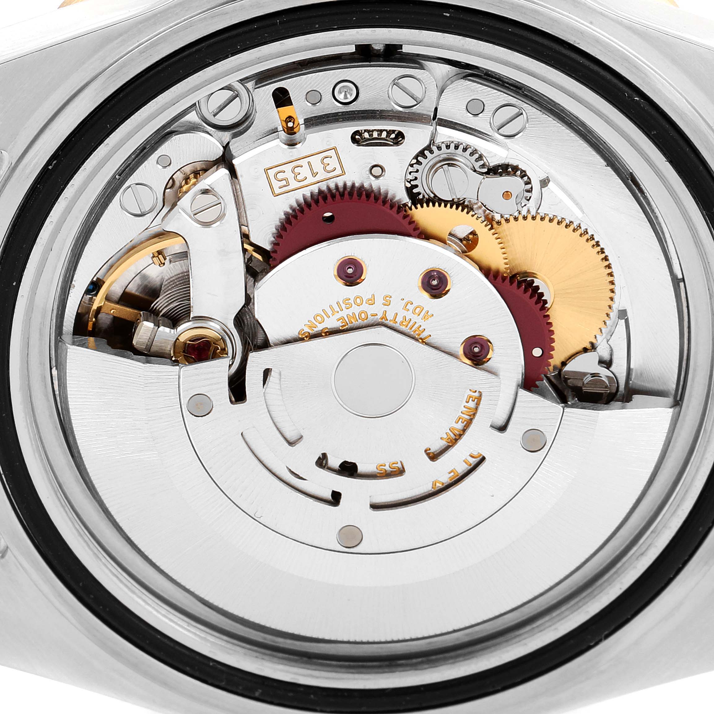The image shows a close-up view of the movement mechanism inside the Rolex Submariner 16613 Men
s Steel and Gold (two tone) Blue Dial 16613 Men
s Steel and Gold (two tone) Blue Dial watch.