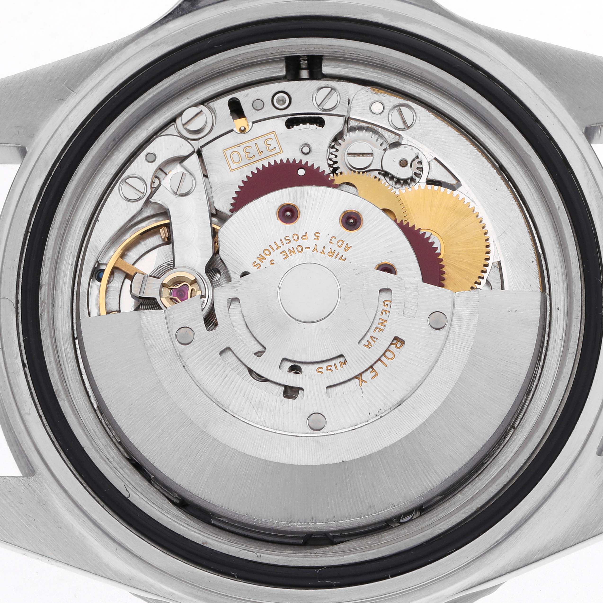 The image shows the movement of a Rolex Submariner 14060 Men's Stainless Steel Black Dial 14060 Men's Stainless Steel Black Dial watch from the back, highlighting its intricate gears and mechanics.