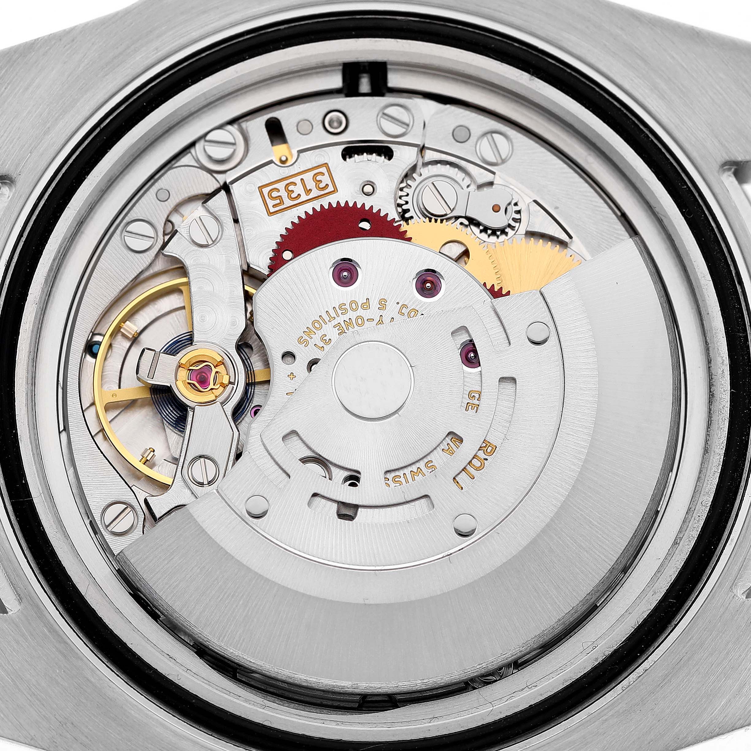 The image shows the back of a Rolex Submariner 116613 Men's Steel and Gold (two tone) Blue Dial, revealing its intricate movement and components.