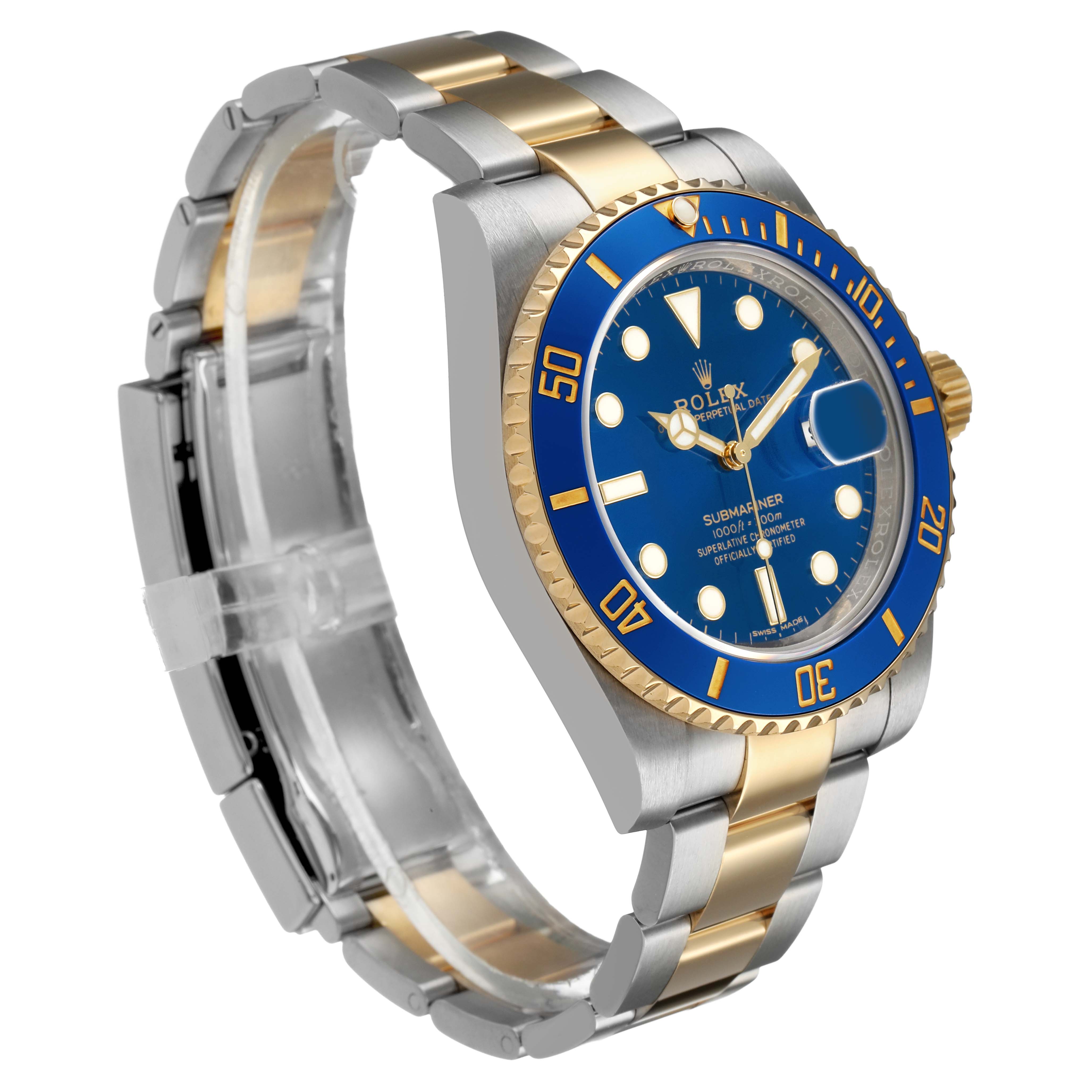 The Rolex Submariner 116613 Men's Steel and Gold (two tone) Blue Dial watch is shown at an angled side view, revealing the bezel, dial, bracelet, and crown.