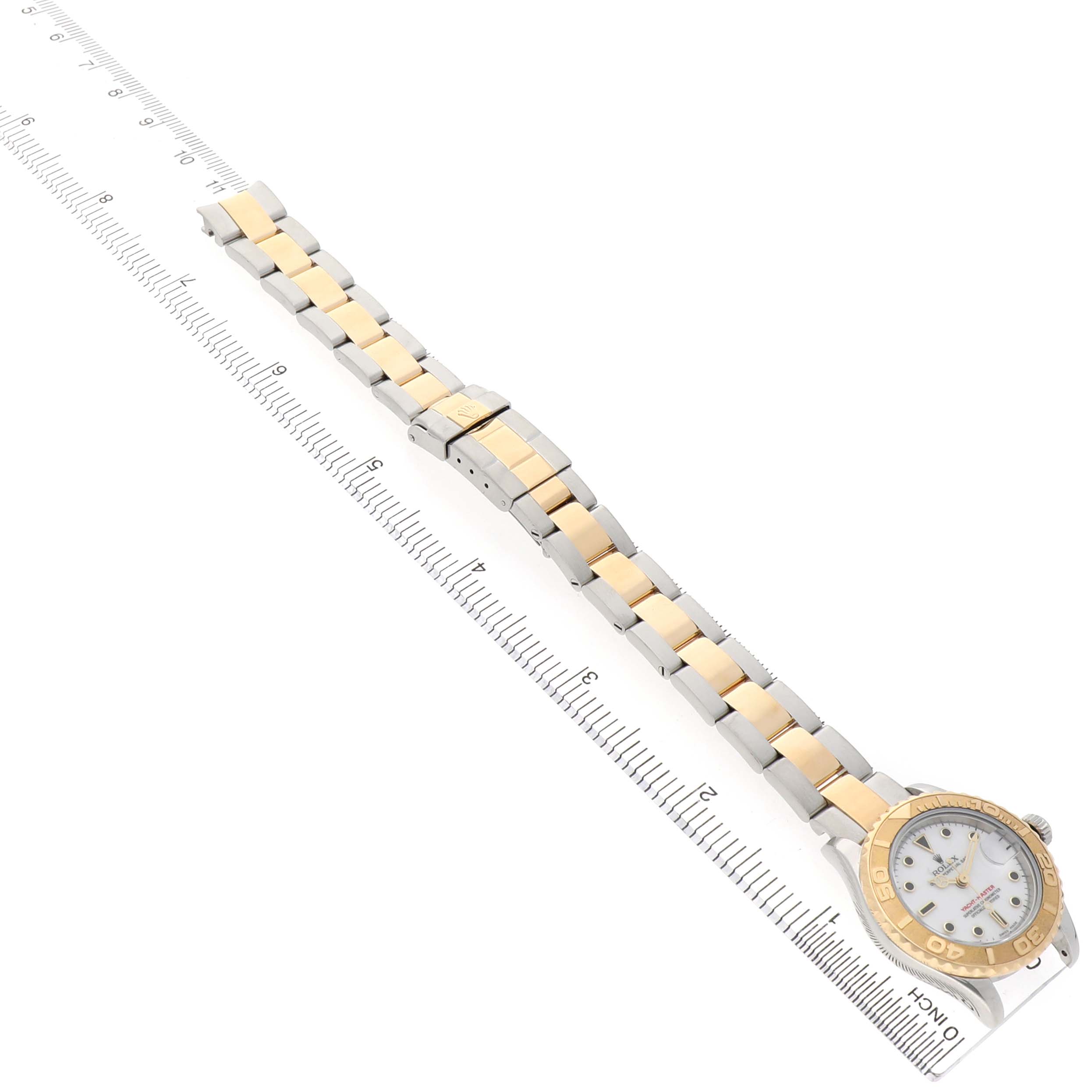 The image shows the Rolex Yacht-Master 169623 Women's Steel and Gold (two tone) White Dial watch from an angled top view, highlighting the bracelet and face.