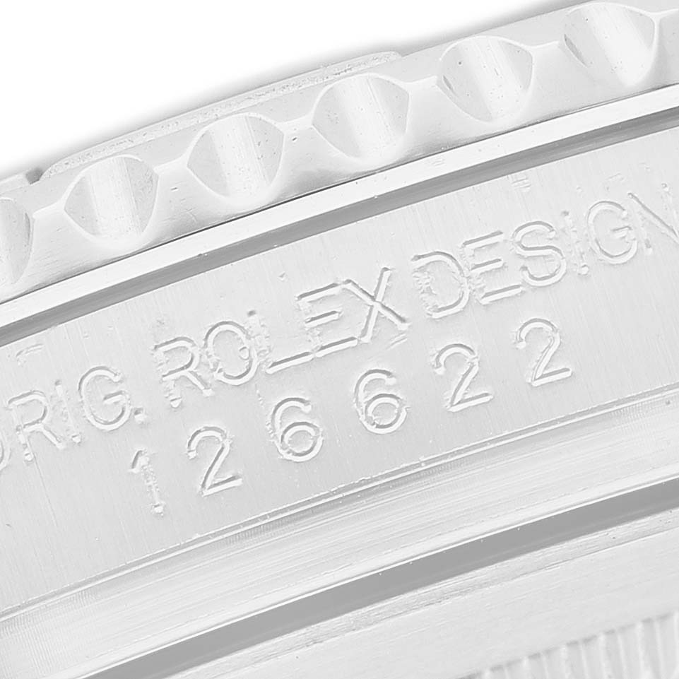 The image shows a close-up of the Rolex Yacht-Master 126622 Men's Stainless Steel Silver Dial's engraved case, featuring the model number and brand name.