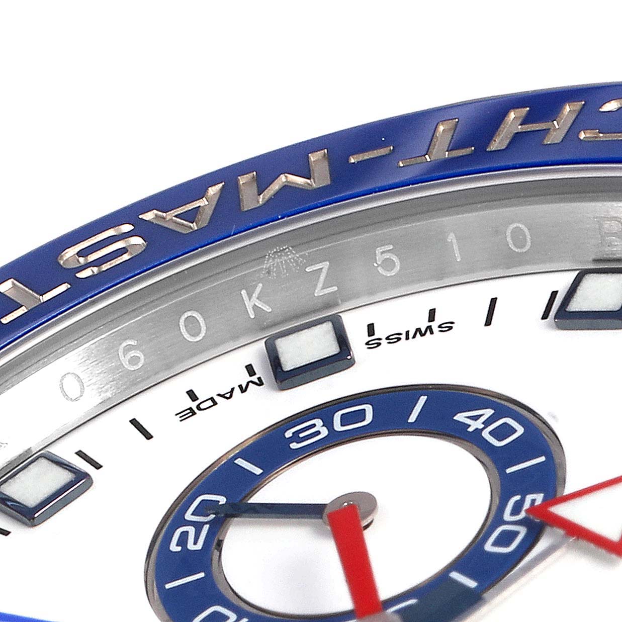 The image shows a close-up of the Rolex Yacht-Master 116680 Men
s Stainless Steel White Dial 116680 Men
s Stainless Steel White Dial watch face and part of the blue bezel.