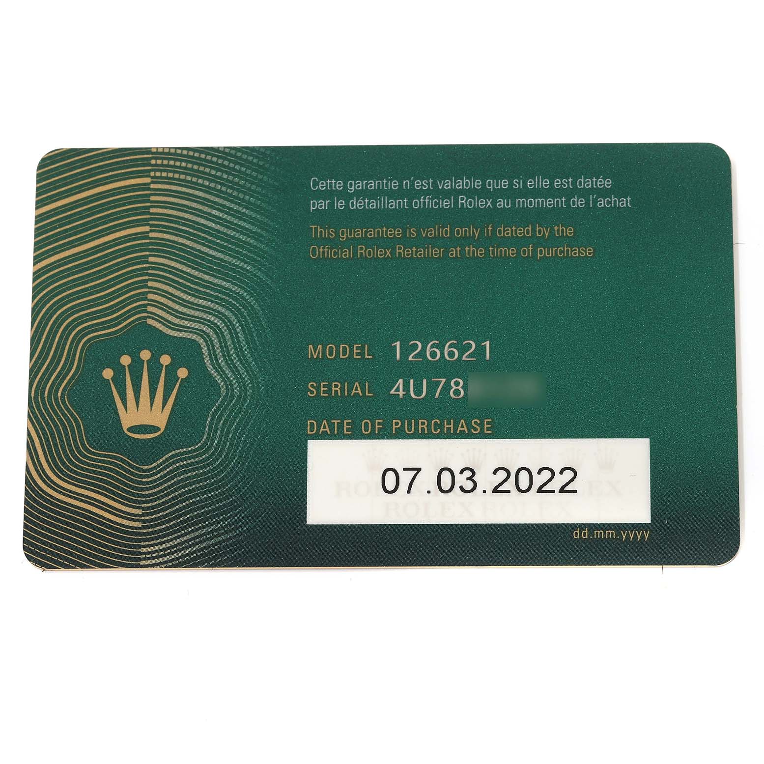 This image shows the green guarantee card for the Rolex Yacht-Master 126621 Men's Steel and Gold (two tone) Black Dial 126621 Men's Steel and Gold (two tone) Black Dial model 126621.