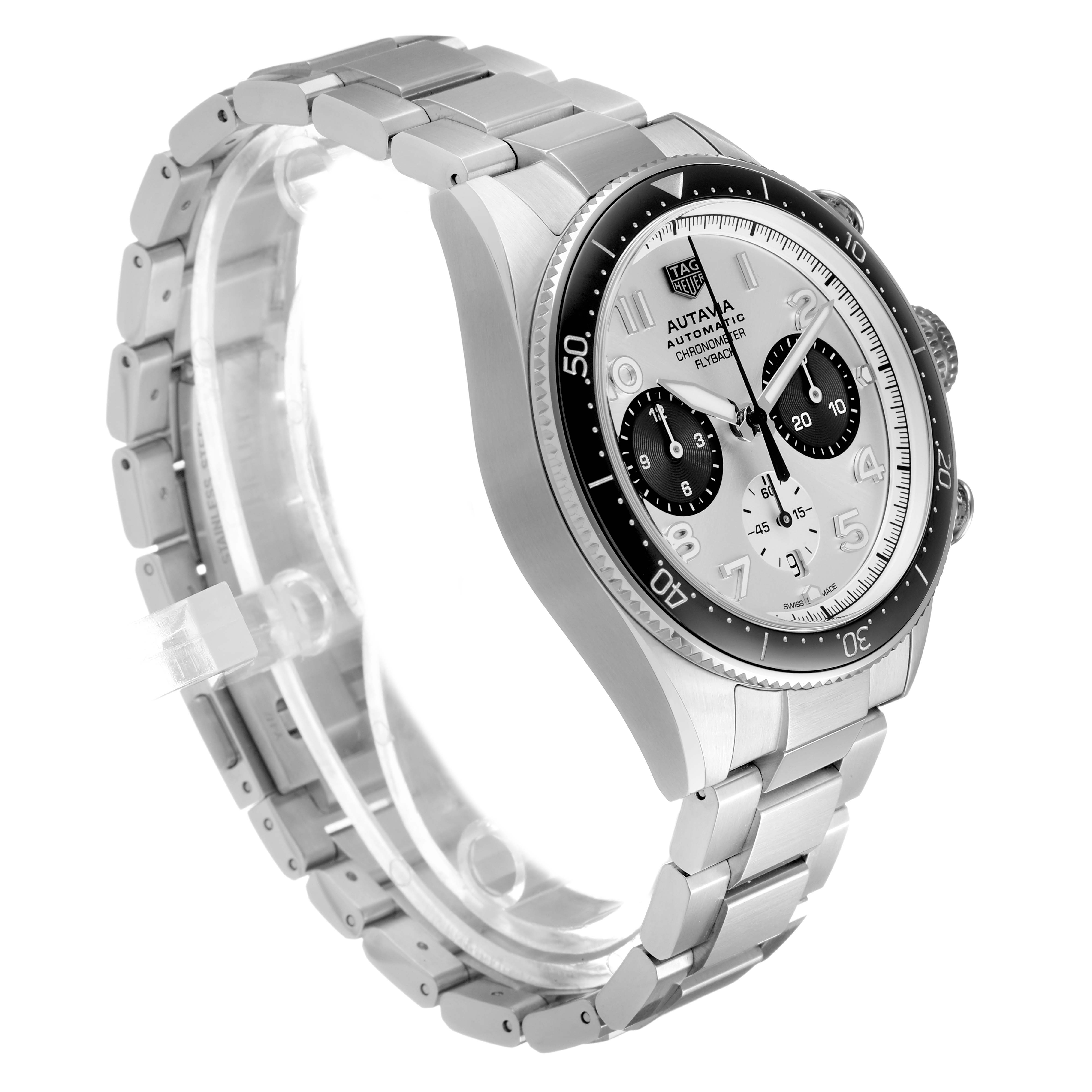 The Tag Heuer Autavia CBE511B Men's Stainless Steel Silver Dial watch is shown from a three-quarter angle, highlighting its dial, bezel, and stainless steel bracelet.