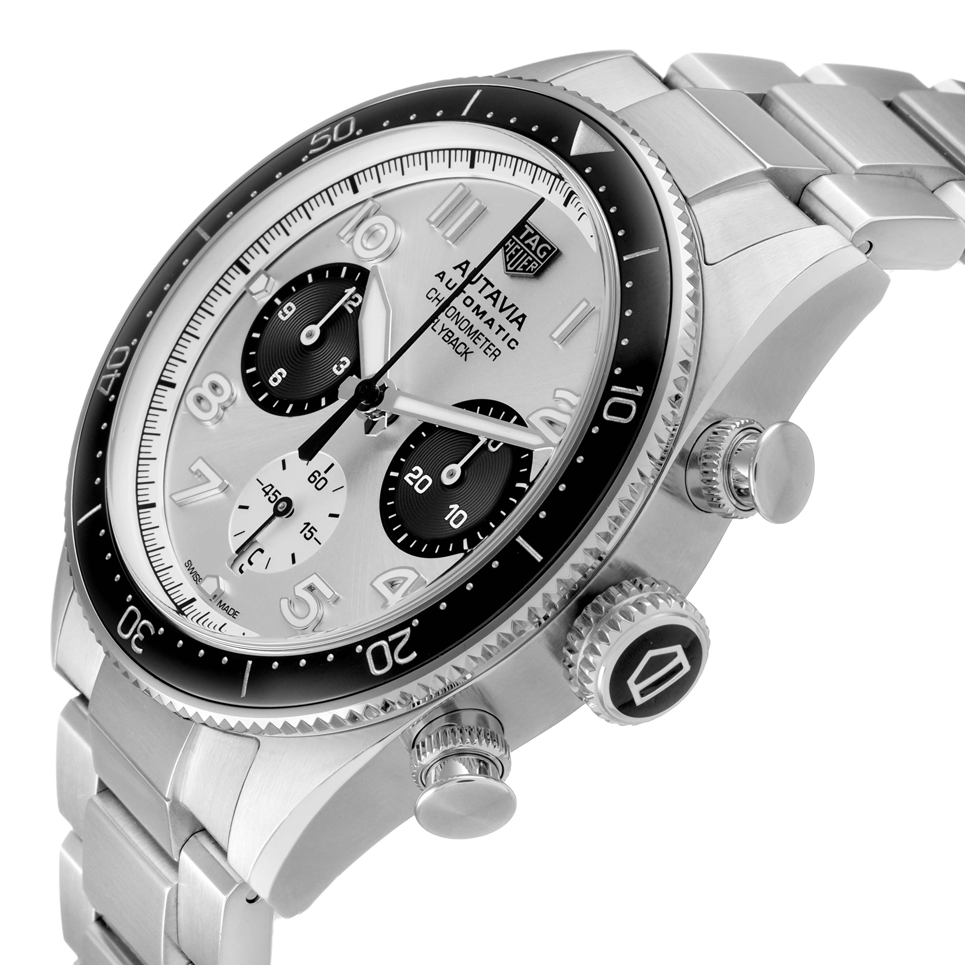 The image shows the Tag Heuer Autavia CBE511B Men's Stainless Steel Silver Dial watch at a three-quarter angle, highlighting the dial, bezel, chronograph subdials, and bracelet.