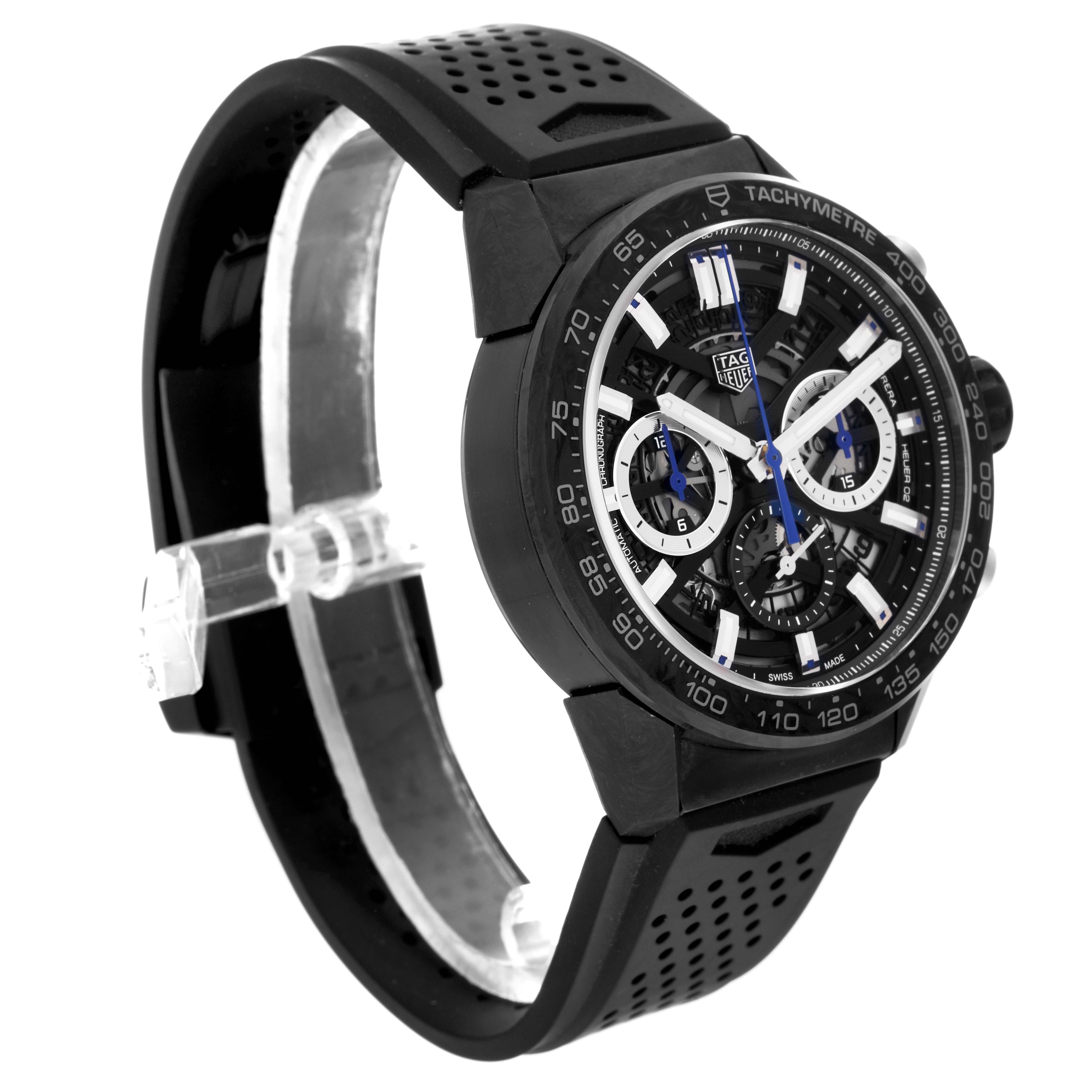 The image shows a side view of the Tag Heuer Limited Edition CBG2017 Men's Stainless Steel Black Dial CBG2017 Men's Stainless Steel Black Dial watch, highlighting its black strap, tachymeter bezel, and intricate dial.