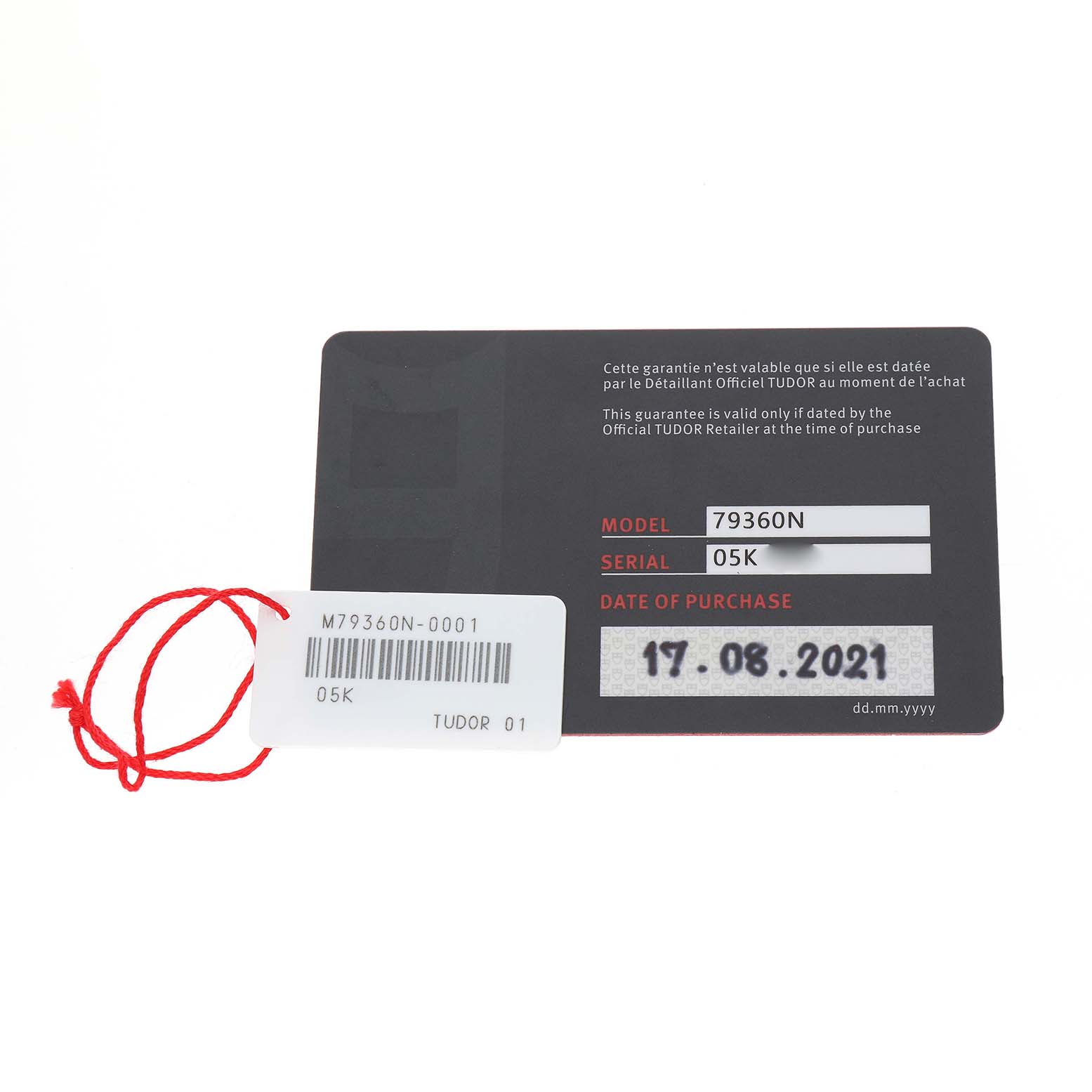 The image shows a Tudor Heritage Chrono 79360N Men's Stainless Steel Black Dial warranty card and tag, focusing on model and serial information.