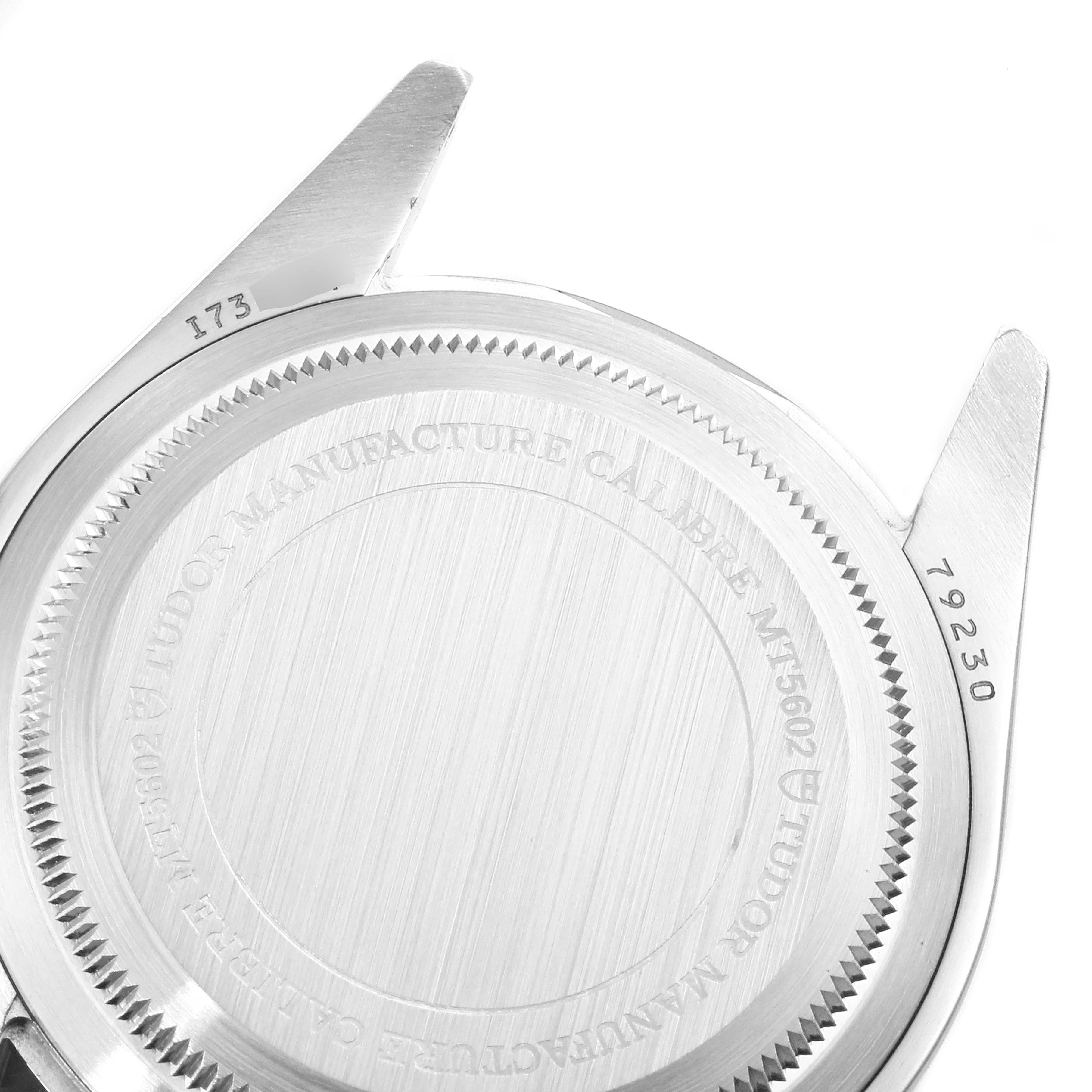 The image shows the caseback and lugs of the Tudor Heritage Black Bay 79230R Men
s Stainless Steel Black Dial 79230R Men
s Stainless Steel Black Dial model, displaying the model number and engravings.