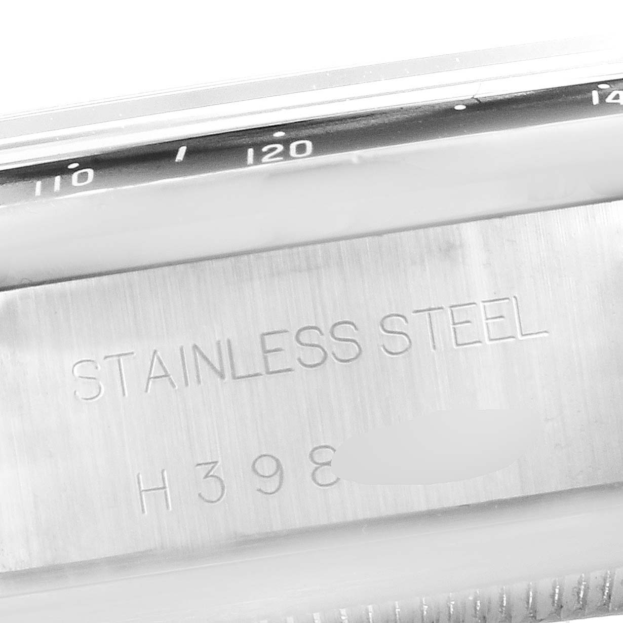 This image shows a close-up of the side casing engraved "STAINLESS STEEL" of a Tudor Prince 79260 Men
s Stainless Steel Black Dial 79260 Men
s Stainless Steel Black Dial watch.