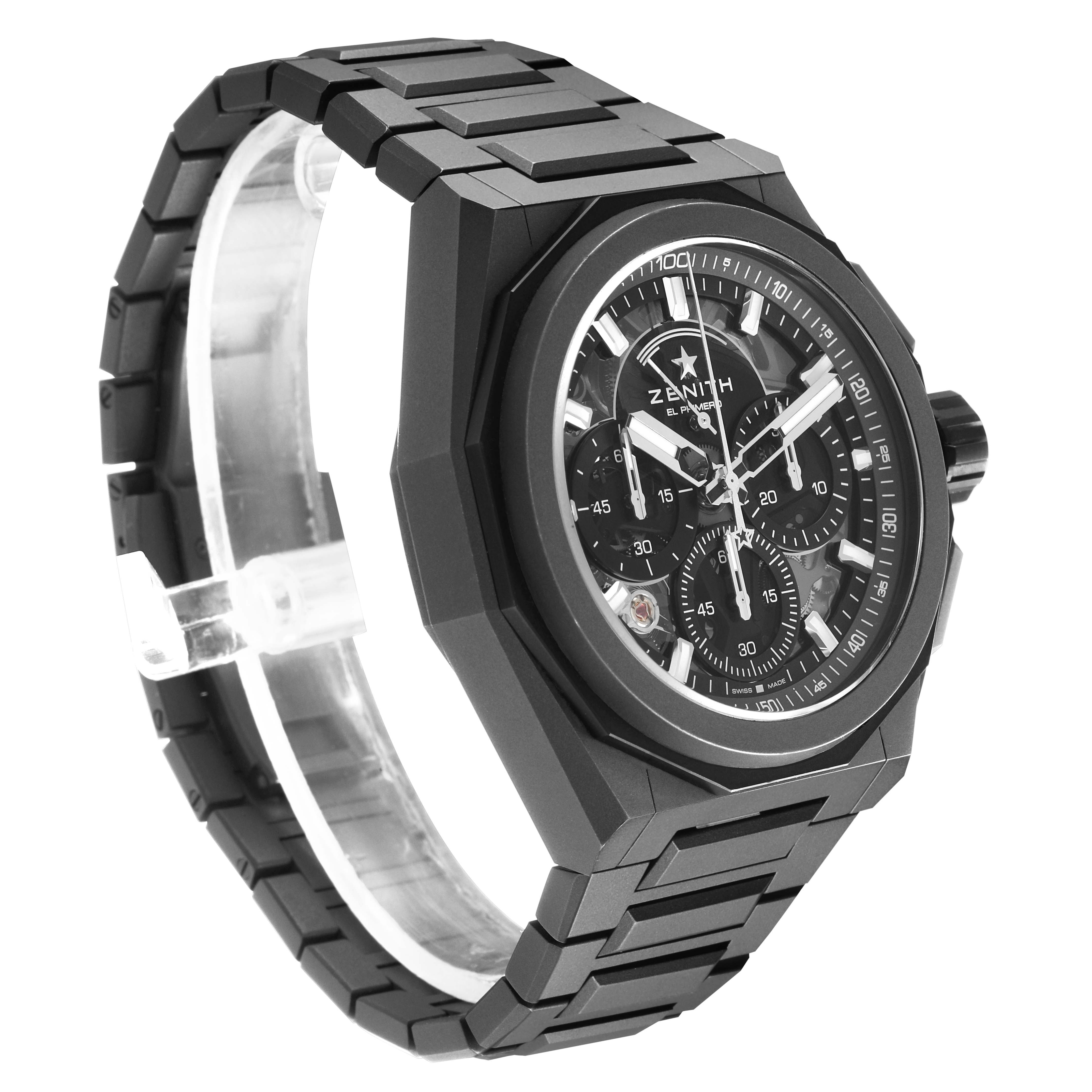 The Zenith Defy 97.9100.9004 Men's Titanium Grey Dial watch is shown at a three-quarter angle, highlighting the case, bracelet, and chronograph details.