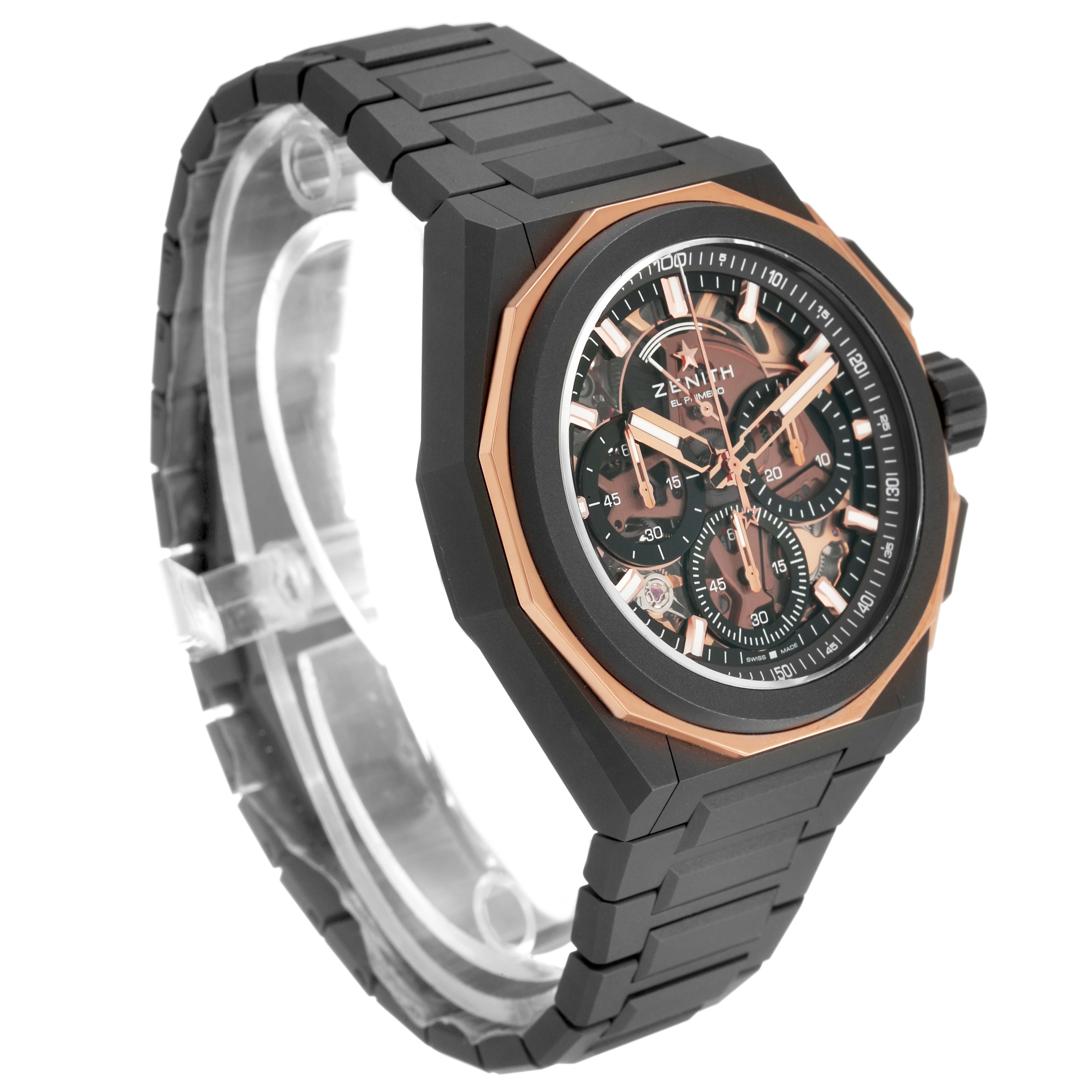 The Zenith Defy 87.9100.9004 Men's Titanium Grey Dial watch is shown at a three-quarter angle, highlighting its case, bezel, dial, and bracelet.