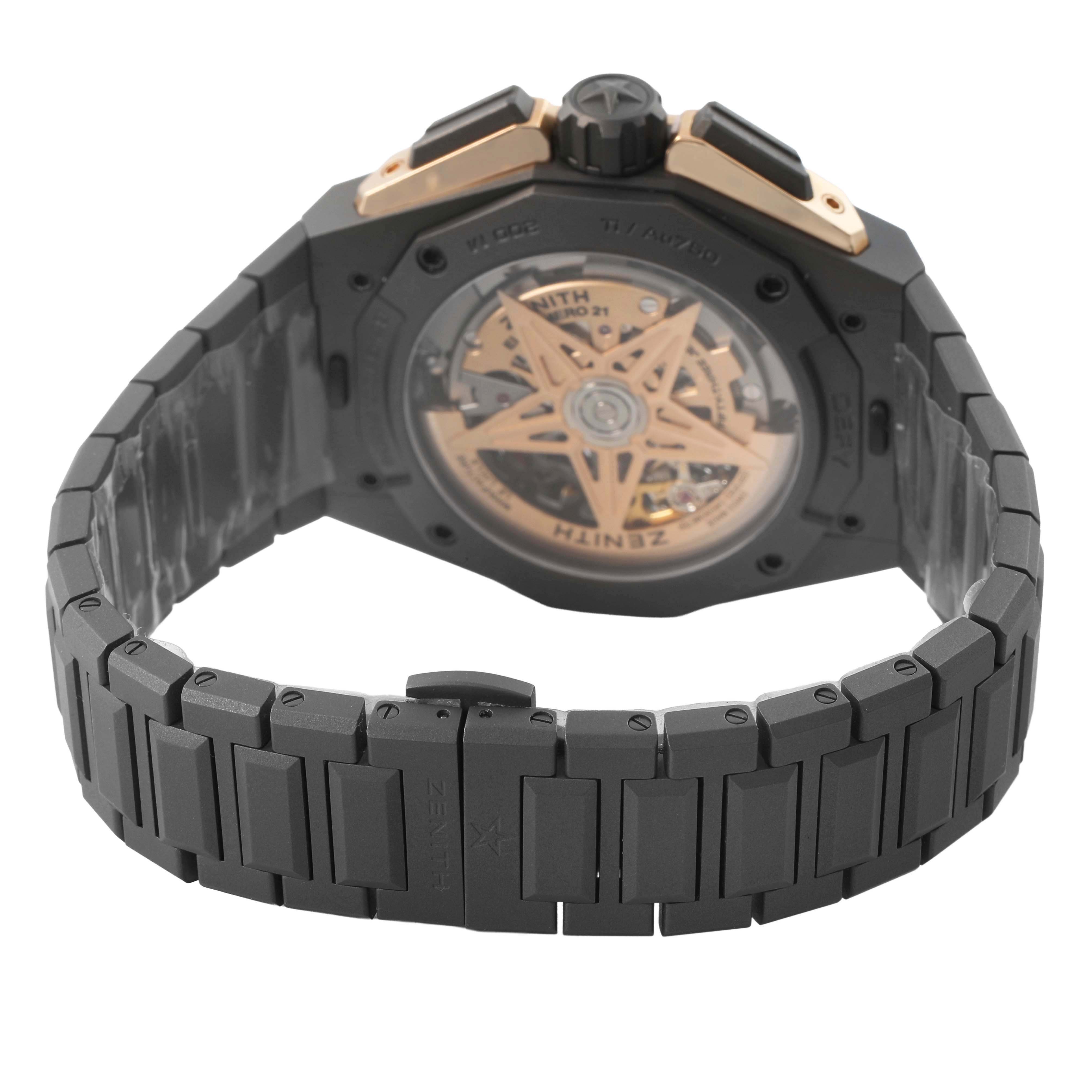 The image shows the back view of the Zenith Defy 87.9100.9004 Men's Titanium Grey Dial watch, highlighting the open case back and metal bracelet.